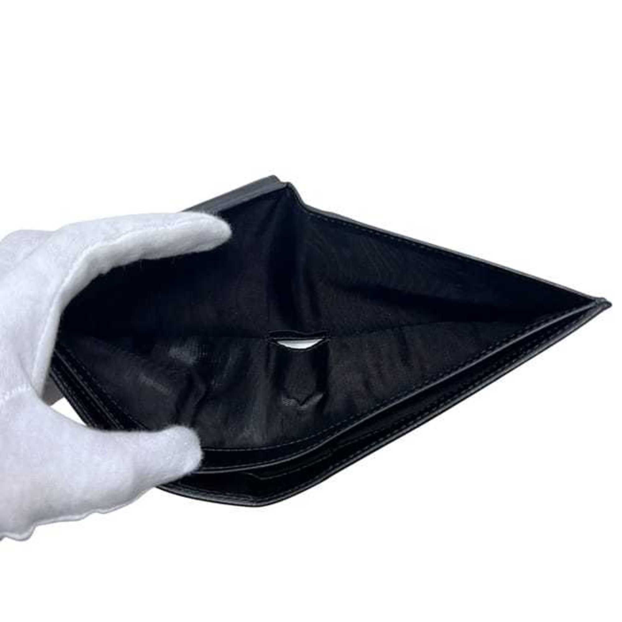 Salvatore Ferragamo Salvatore Ferragamo bifold wallet ec-25055 in black with Gancini KD 66 9296 leather. This is made of coated leather and suitable for both men women. Size ONE SIZE - 6 Thumbnail