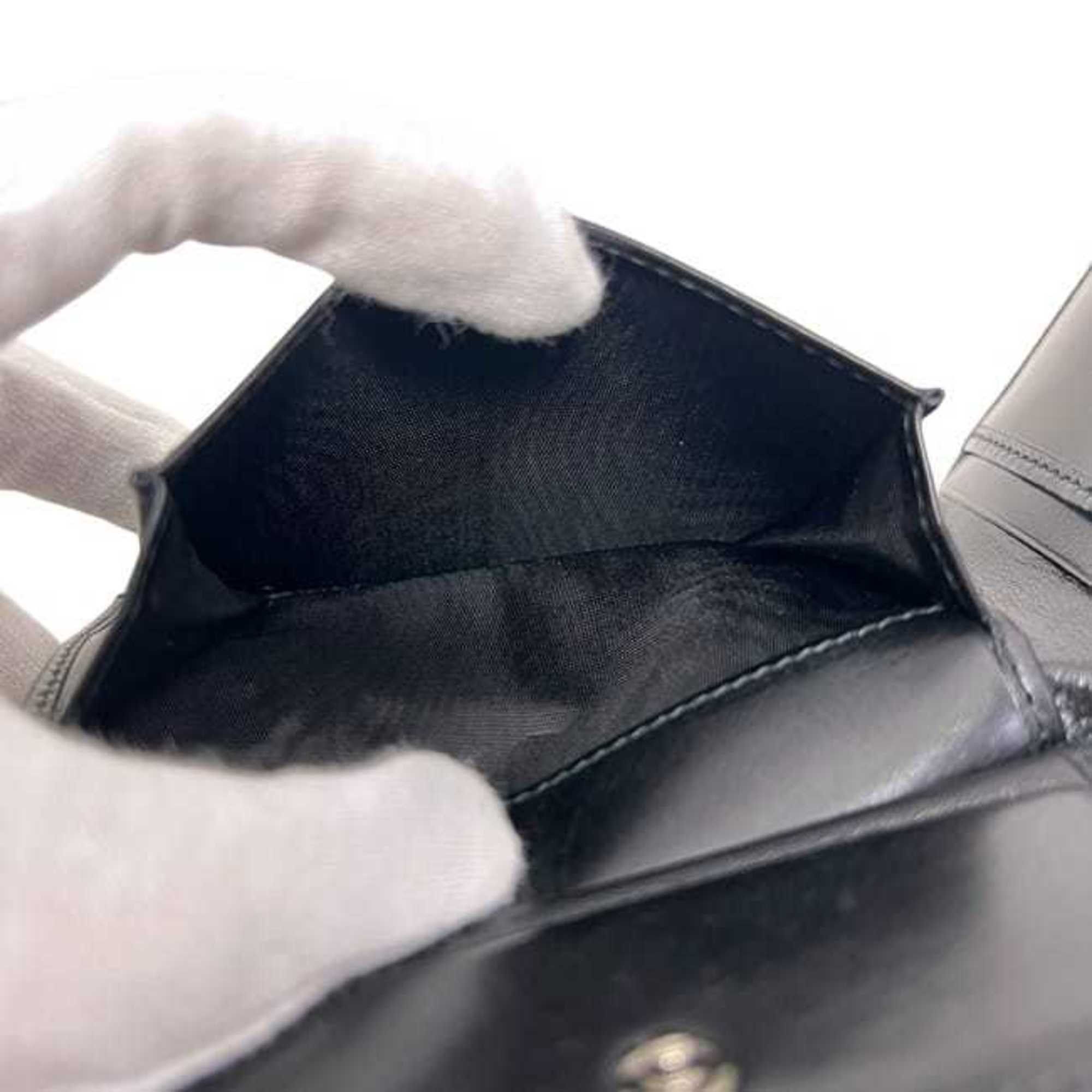 Salvatore Ferragamo Salvatore Ferragamo bifold wallet ec-25055 in black with Gancini KD 66 9296 leather. This is made of coated leather and suitable for both men women. Size ONE SIZE - 7 Thumbnail
