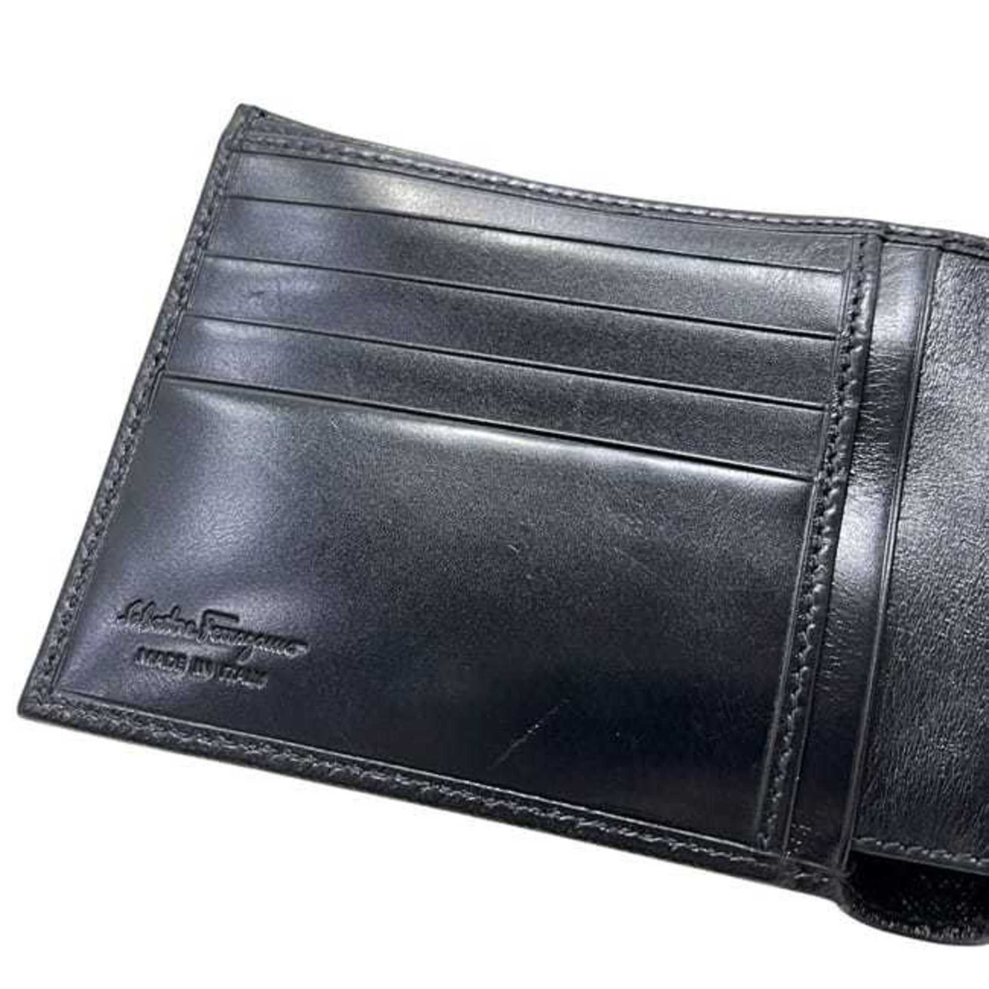 Salvatore Ferragamo Salvatore Ferragamo bifold wallet ec-25055 in black with Gancini KD 66 9296 leather. This is made of coated leather and suitable for both men women. Size ONE SIZE - 9 Thumbnail