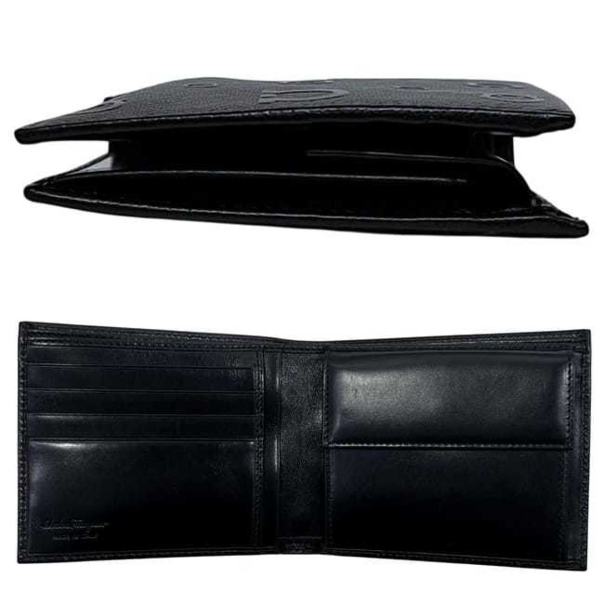 Salvatore Ferragamo Salvatore Ferragamo bifold wallet ec-25055 in black with Gancini KD 66 9296 leather. This is made of coated leather and suitable for both men women. Size ONE SIZE - 3 Thumbnail