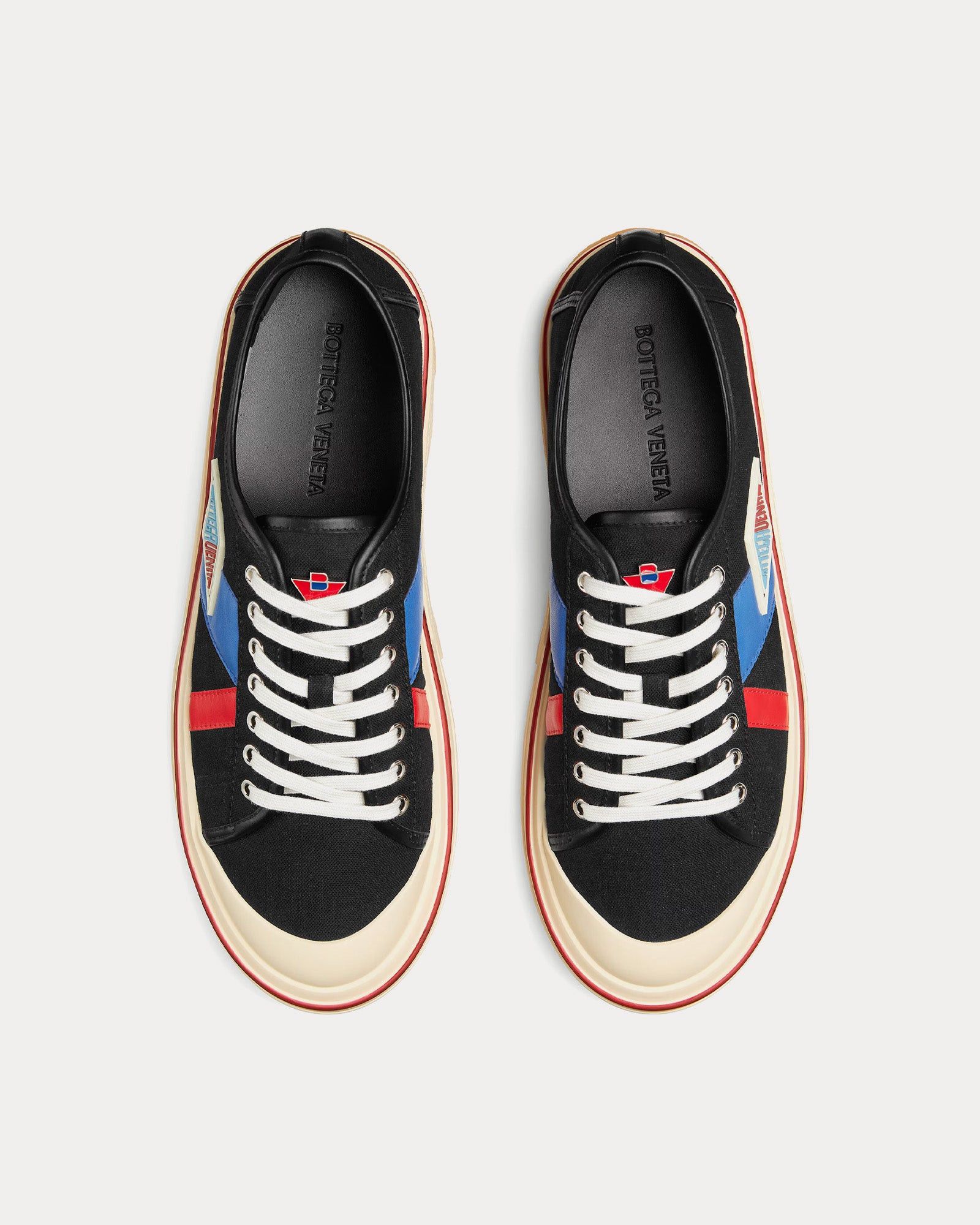 Eliot leather-trimmed canvas low top sneakers in black