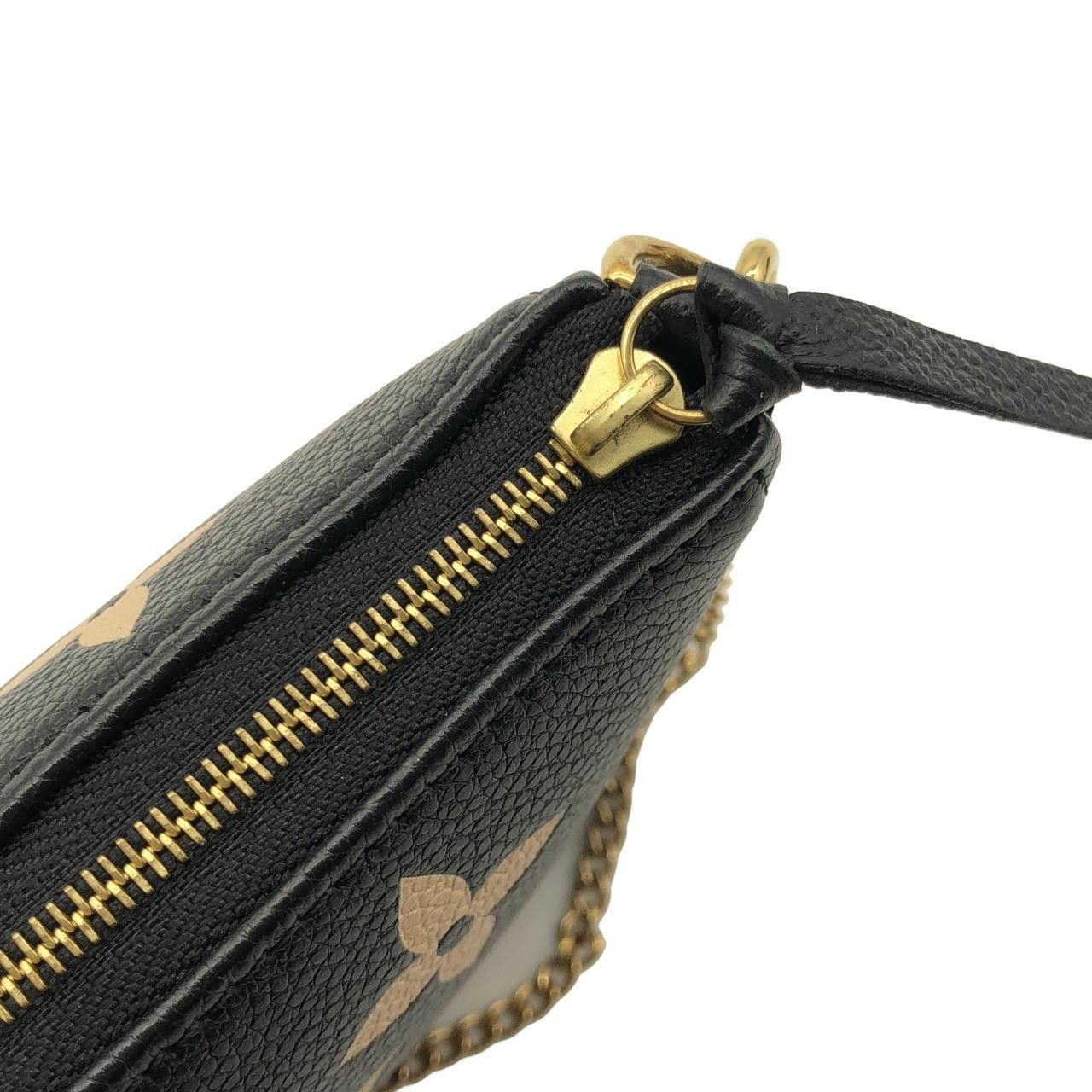 Louis Vuitton Louis Vuitton Louis Vuitton Bicolor Monogram Empreinte Accessory Pouch Leather Vanity Bag M80732 DUTY FREE for USA Size ONE SIZE - 4 Thumbnail