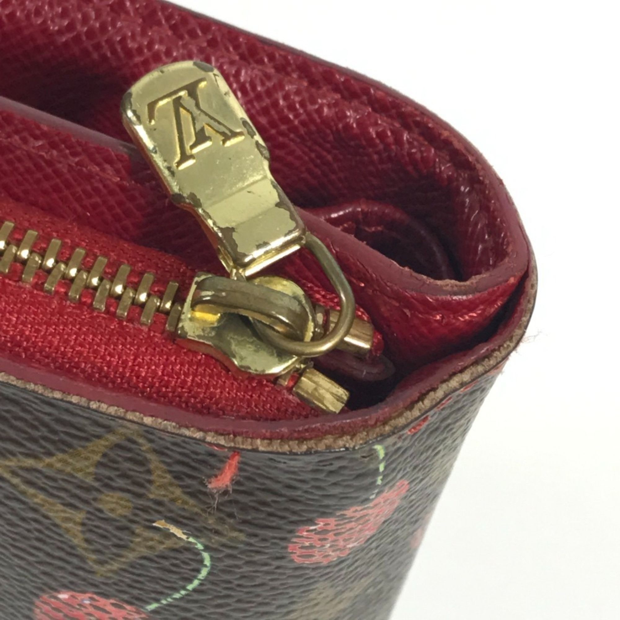 LOUIS VUITTON M95005 Monogram Cherry Compact Zip Wallet, designed by Takashi Murakami, featuring a cherry design. This compact, bi-fold wallet is crafted from canvas and available in brown for both men women.