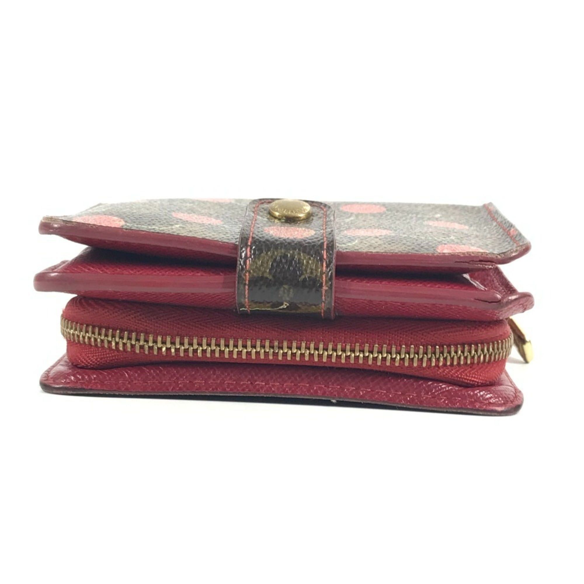 LOUIS VUITTON M95005 Monogram Cherry Compact Zip Wallet, designed by Takashi Murakami, featuring a cherry design. This compact, bi-fold wallet is crafted from canvas and available in brown for both men women.