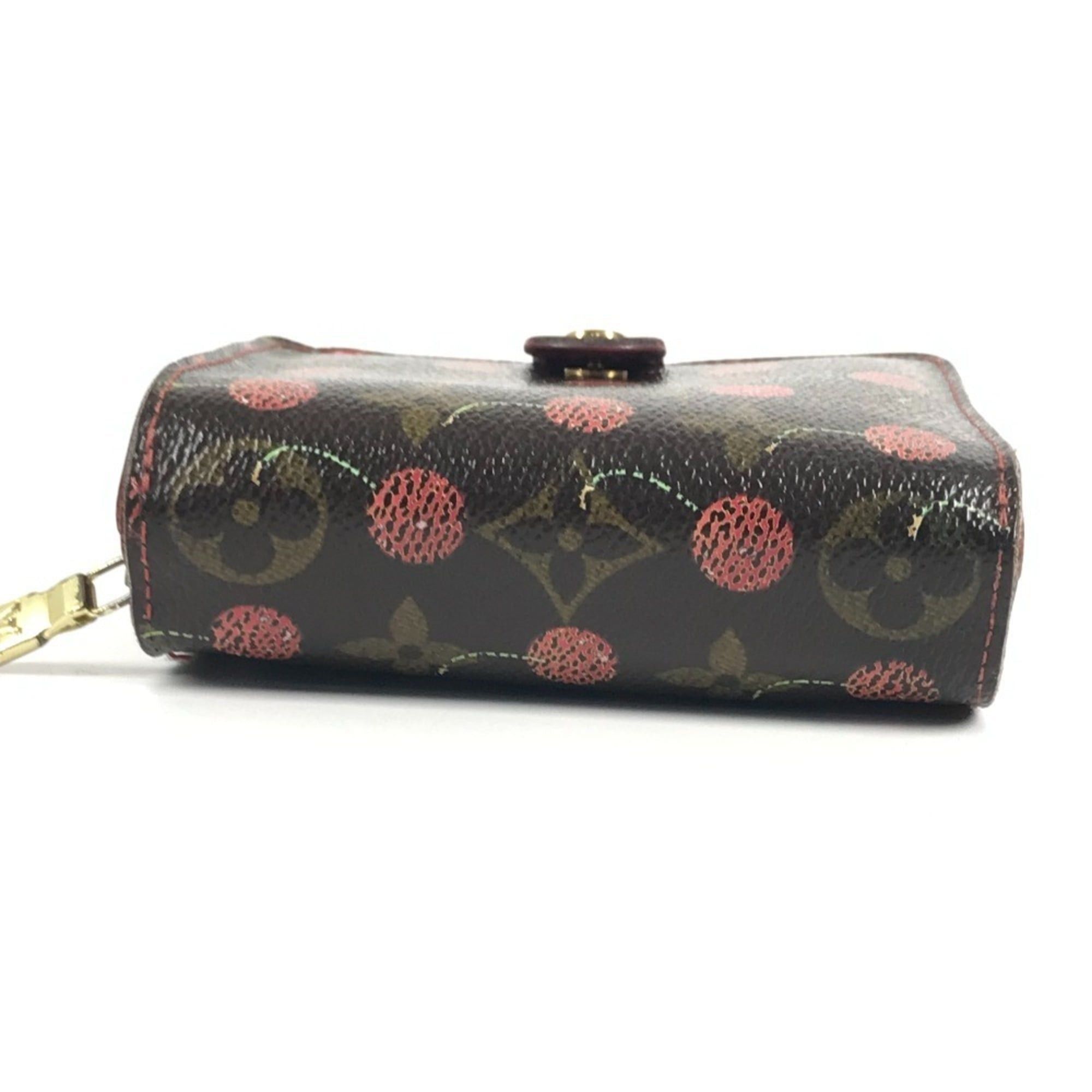 LOUIS VUITTON M95005 Monogram Cherry Compact Zip Wallet, designed by Takashi Murakami, featuring a cherry design. This compact, bi-fold wallet is crafted from canvas and available in brown for both men women.