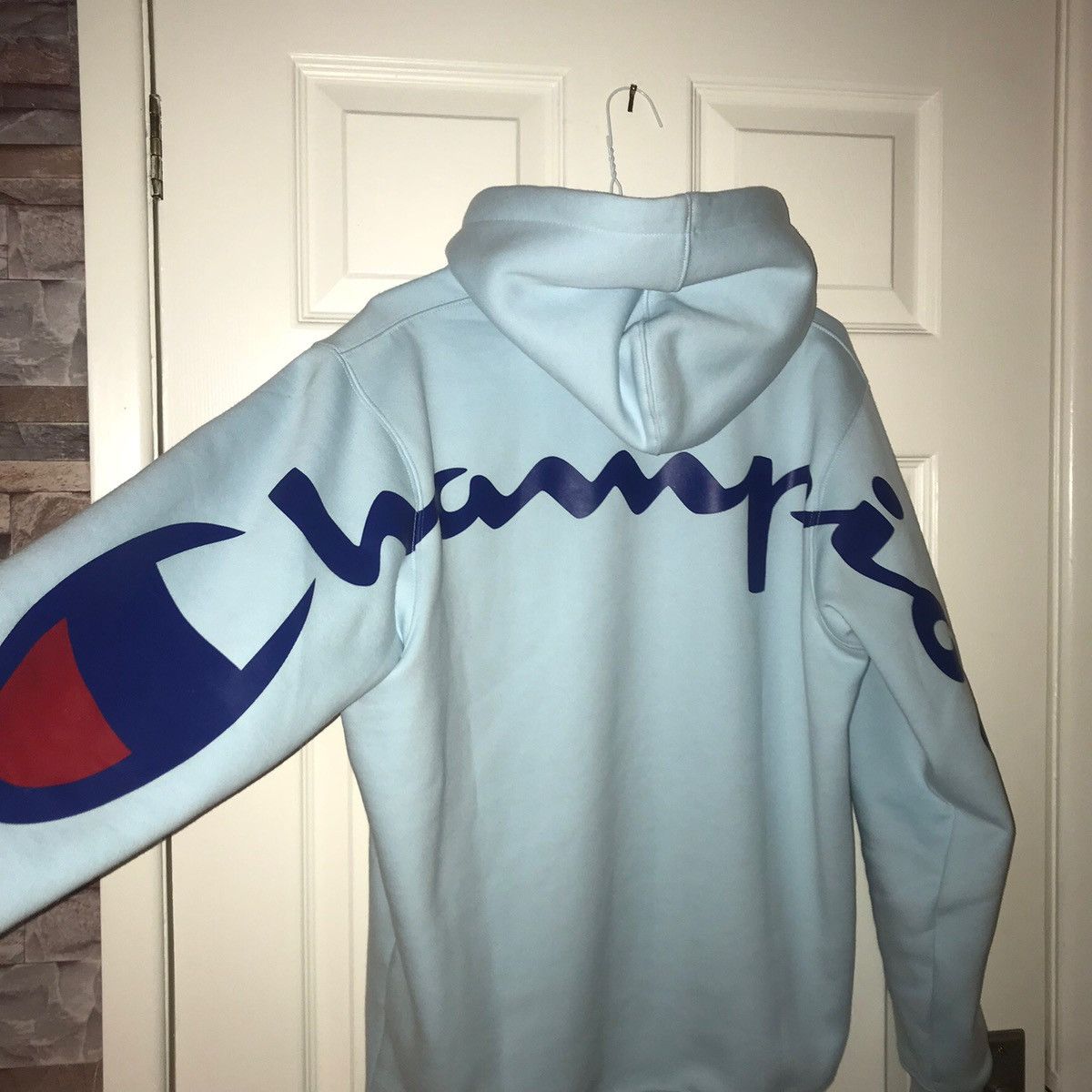 Supreme champion hoodie hot sale light blue