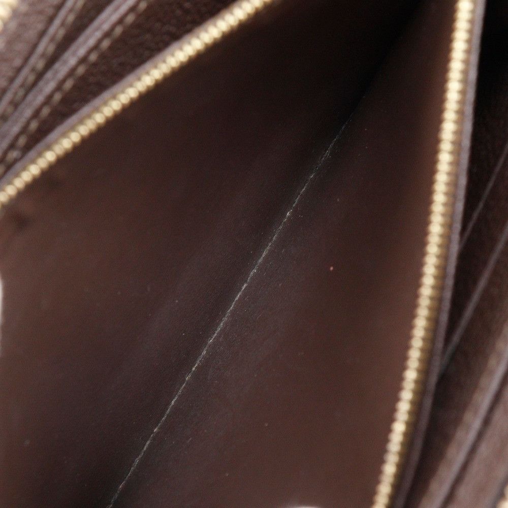 Louis Vuitton Louis Vuitton Louis Vuitton Portefeuille Secret Long Monogram Empreinte Wallet Textile Long Wallet M93436 DUTY FREE for USA Size ONE SIZE - 7 Thumbnail