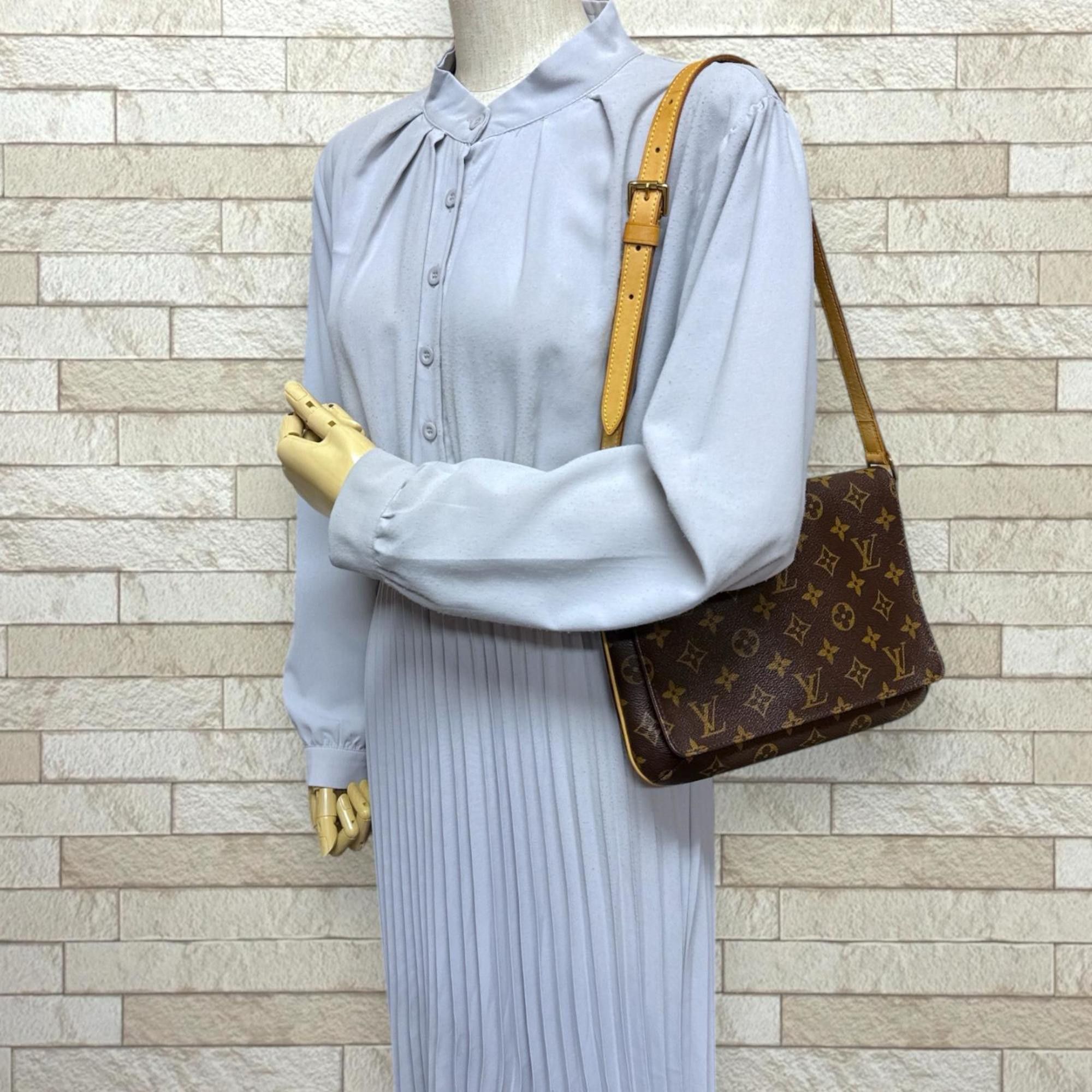 Louis Vuitton Pre-owned Louis Vuitton Musette Tango Short Monogram Shoulder Bag in Canvas (M51257) Brown. Women's. Size ONE SIZE - 2 Thumbnail