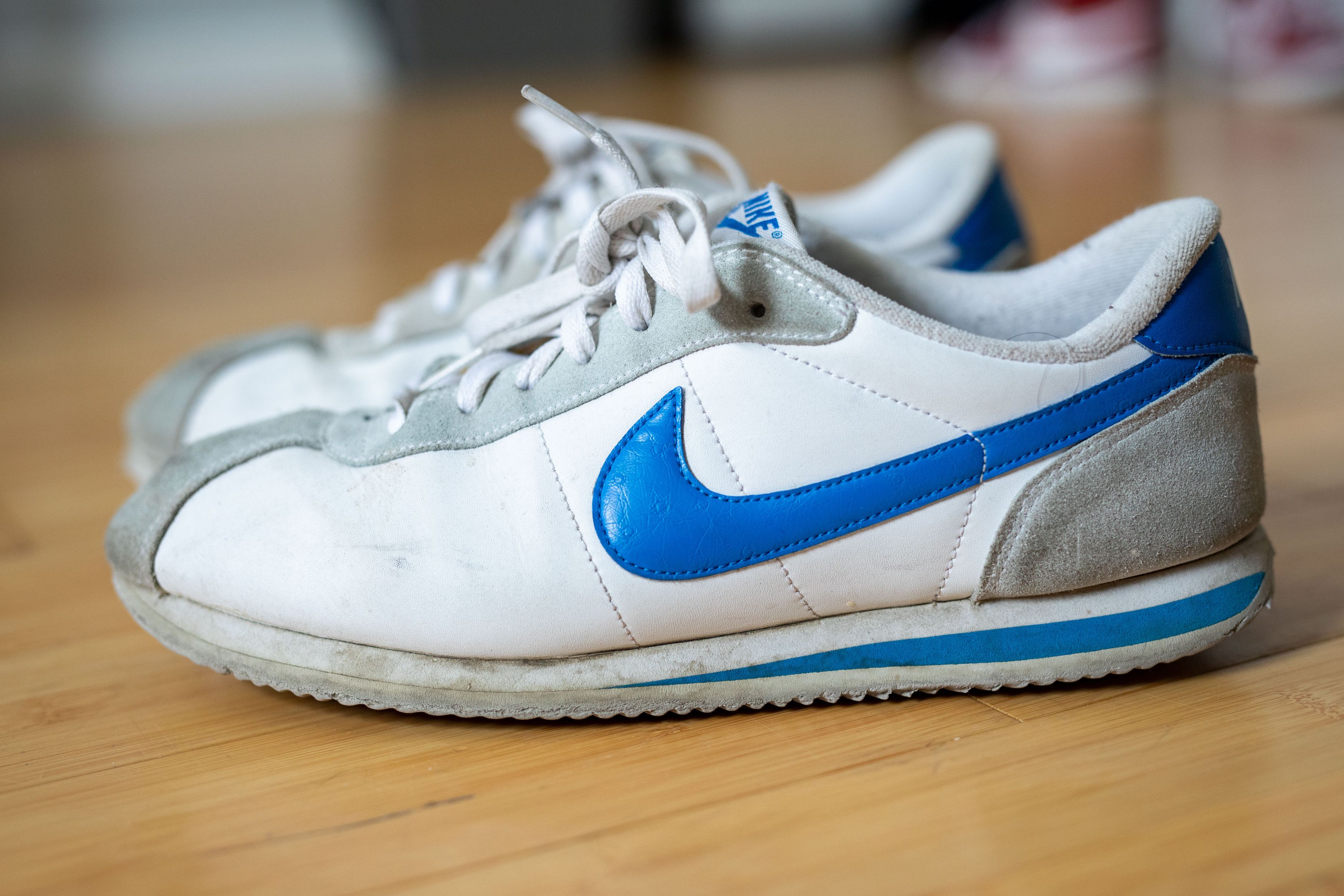 Nike cortez white gym blue best sale