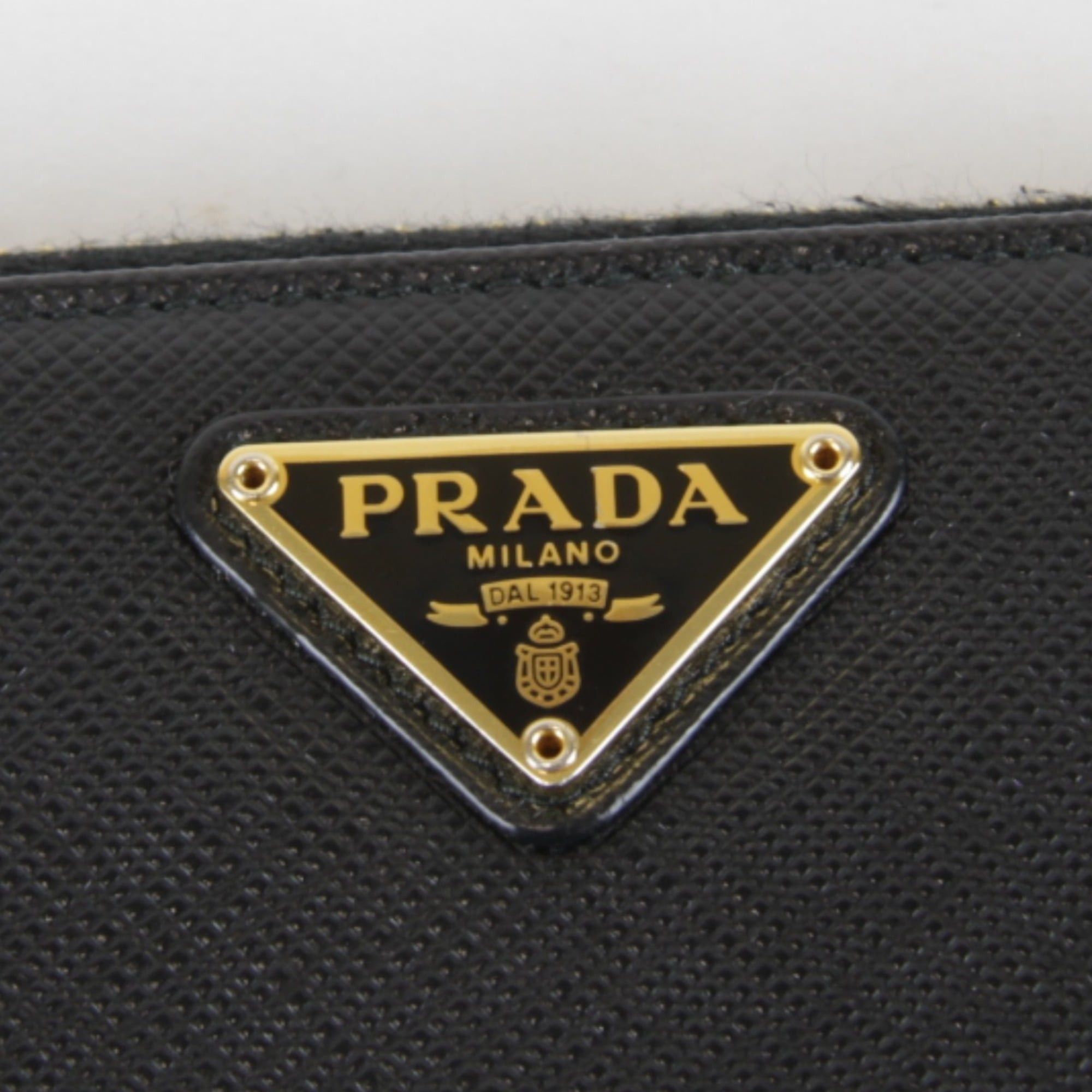 PRADA Saffiano Round Long Wallet in Black Leather for Women