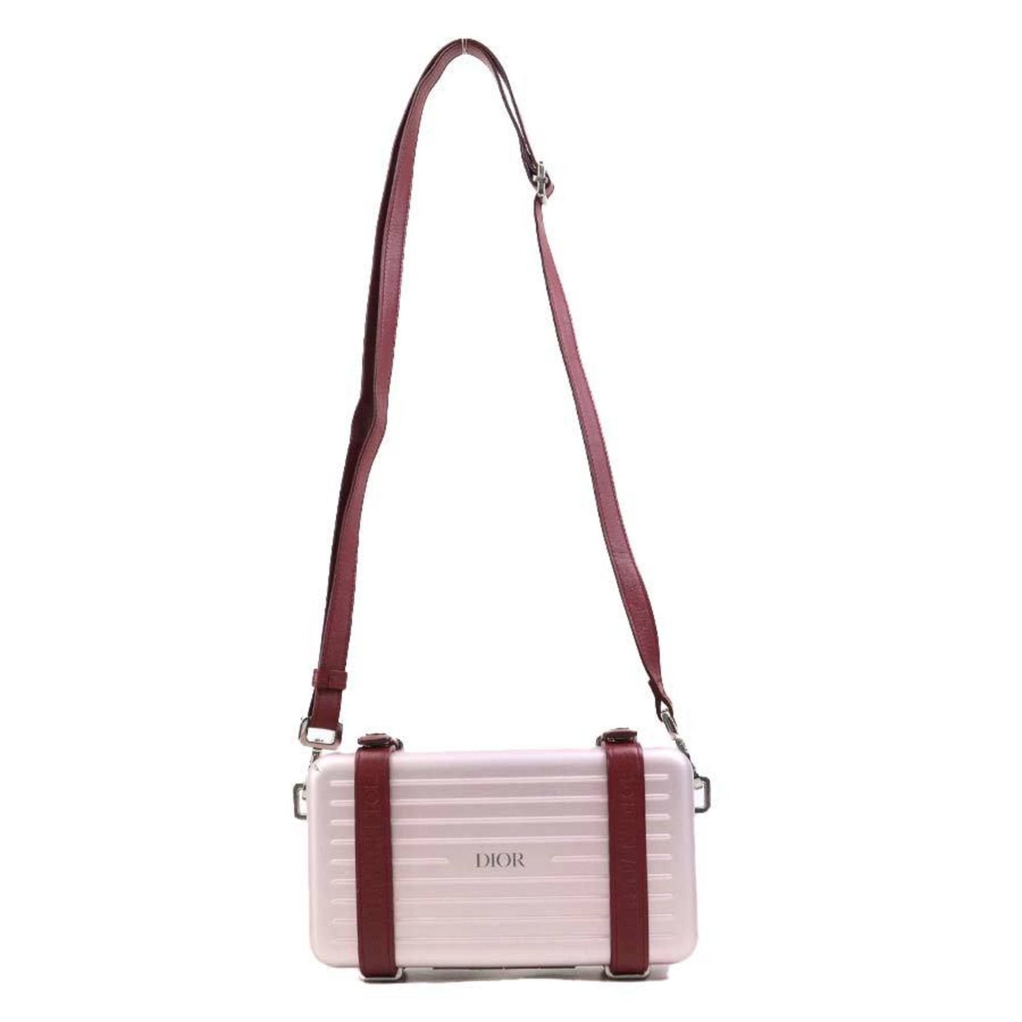 Dior Christian Dior crossbody shoulder bag, wallet, and Rimowa personal clutch bag in leather, aluminum, metallic pink, burgundy, silver. Free shipping. (e61543a) Size ONE SIZE - 17 Thumbnail