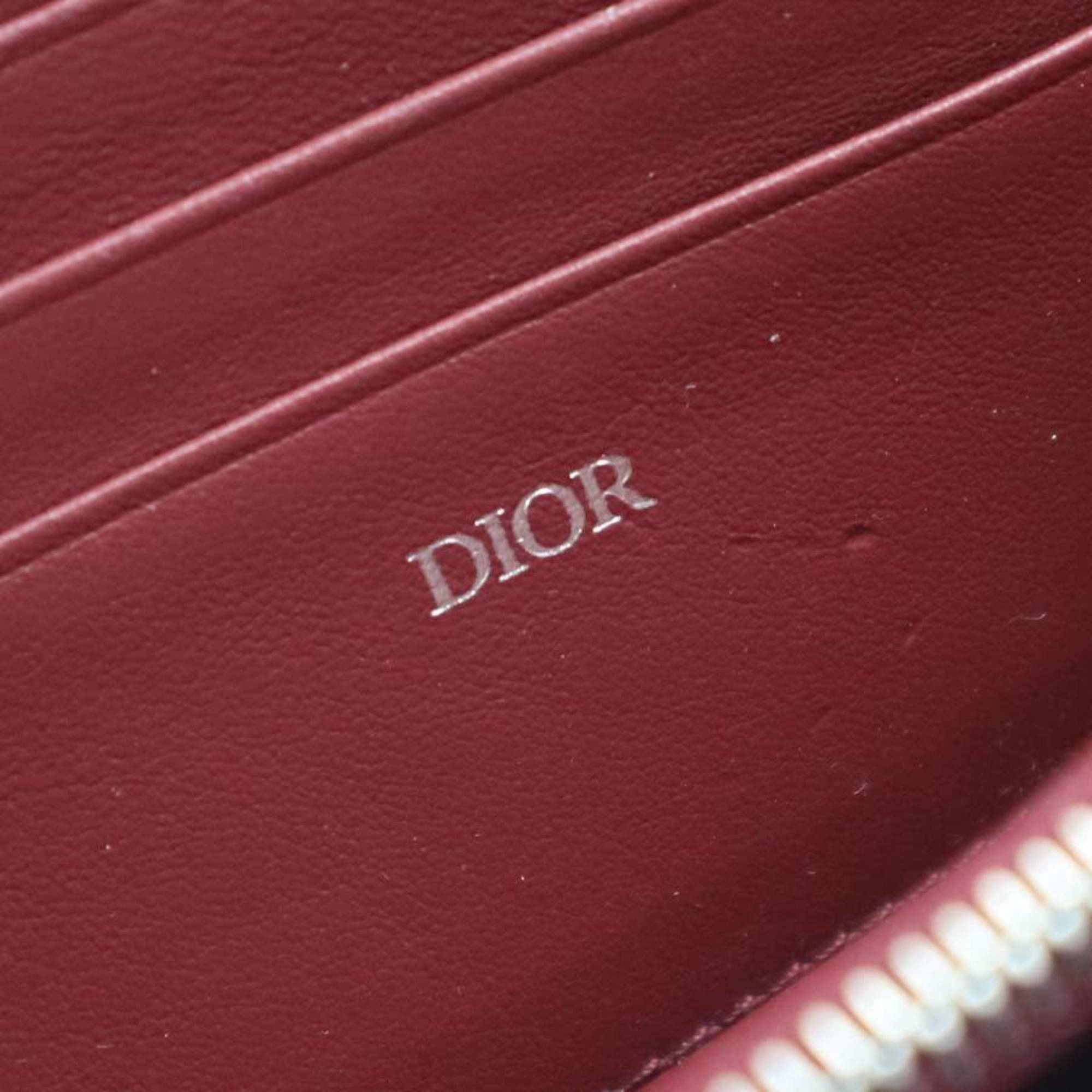 Dior Christian Dior crossbody shoulder bag, wallet, and Rimowa personal clutch bag in leather, aluminum, metallic pink, burgundy, silver. Free shipping. (e61543a) Size ONE SIZE - 16 Thumbnail
