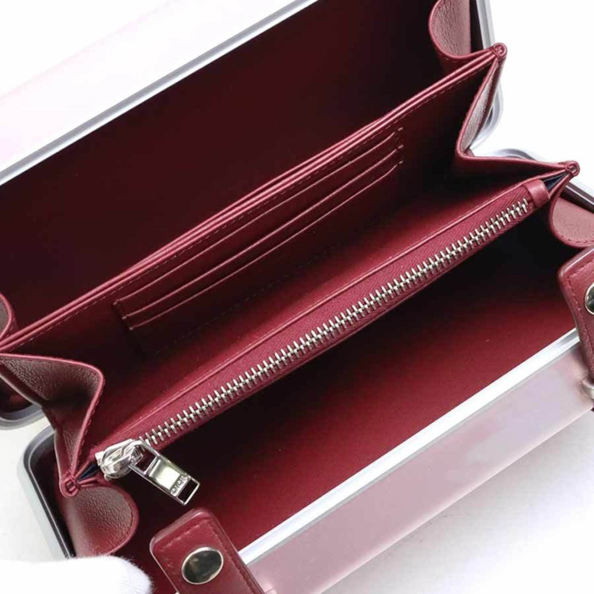 Dior Christian Dior crossbody shoulder bag, wallet, and Rimowa personal clutch bag in leather, aluminum, metallic pink, burgundy, silver. Free shipping. (e61543a) Size ONE SIZE - 5 Thumbnail