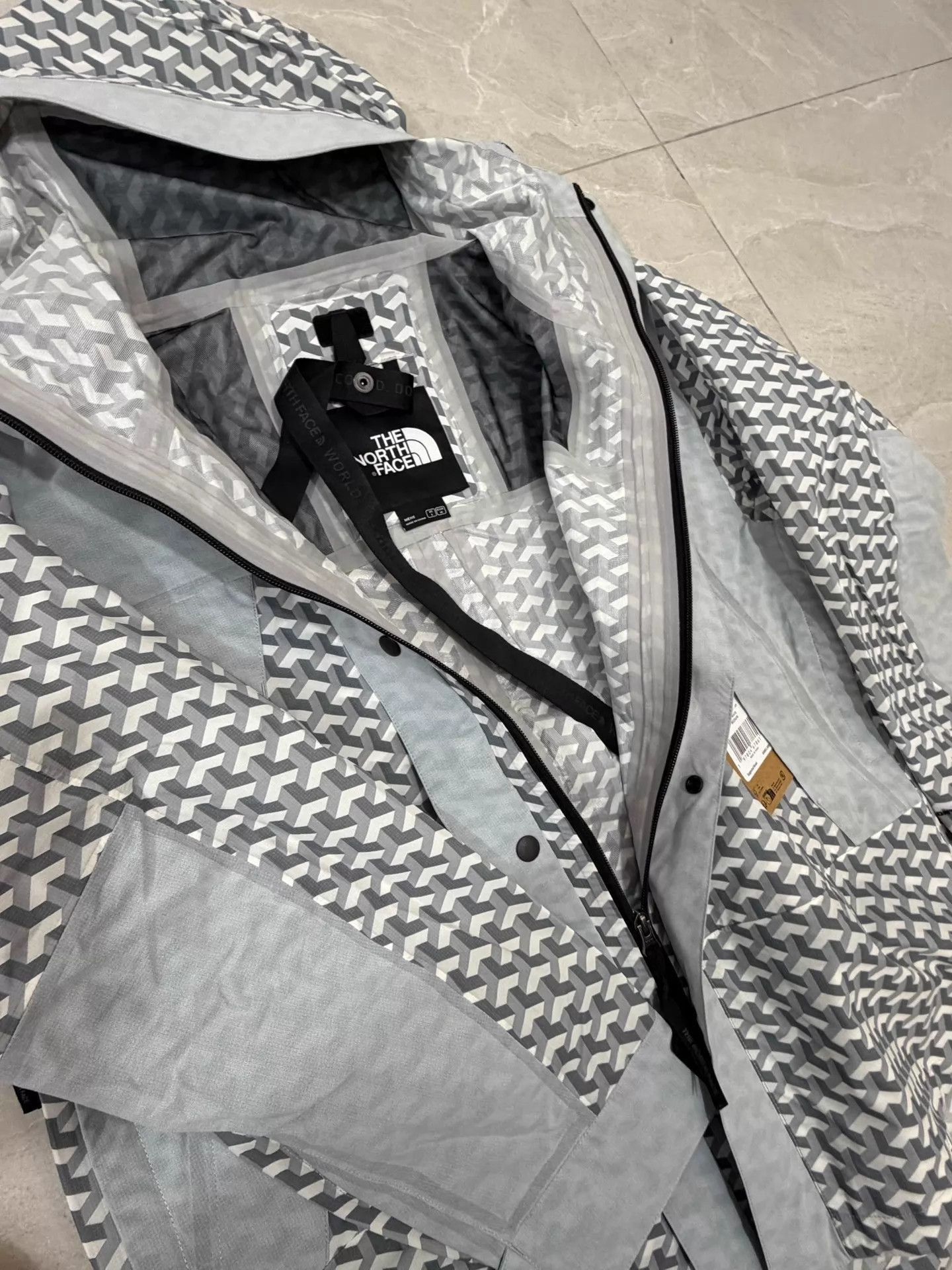The North Face Gray Patterned Hooded Rain Jacket - Size S Size US S / EU 44-46 / 1 - 4 Thumbnail