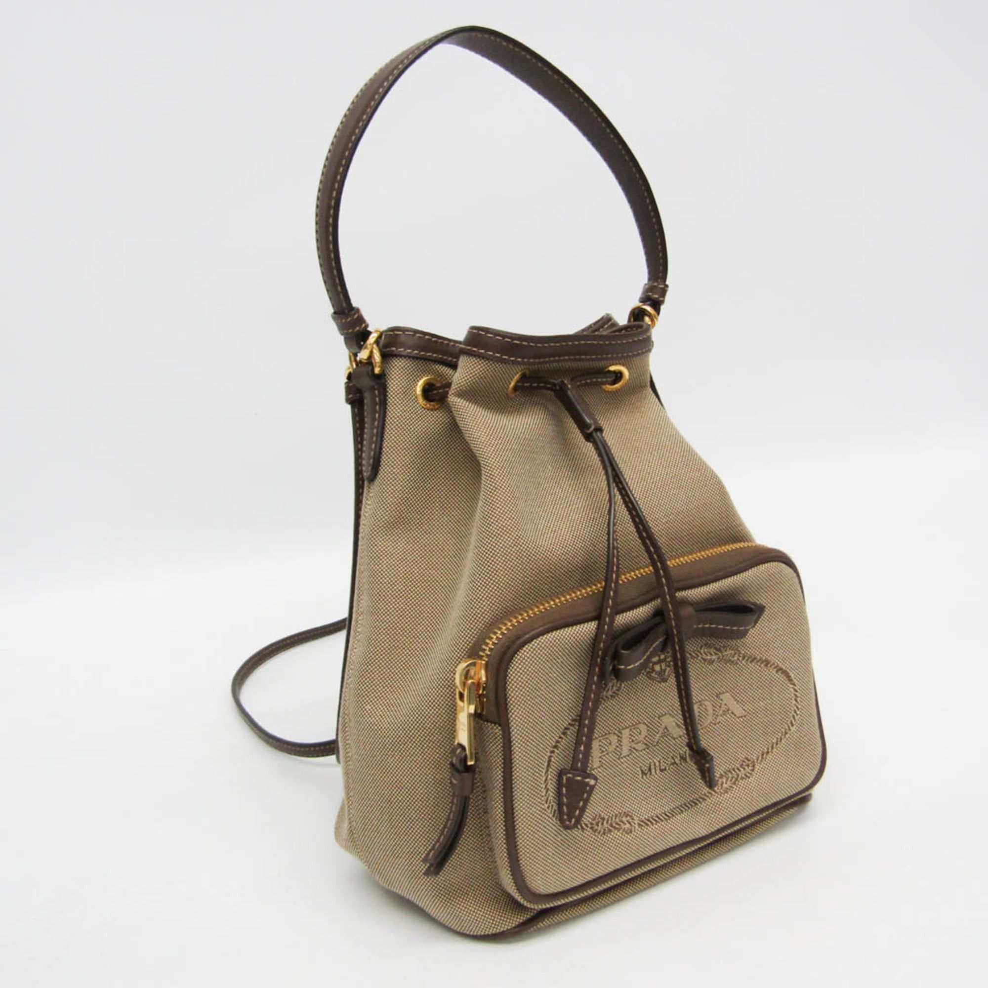 Prada Prada Logo Jacquard Drawstring Bag Women's Leather,Jacquard Handbag,Shoulder Bag Beige Brown,Dark Brown Size ONE SIZE - 8 Thumbnail