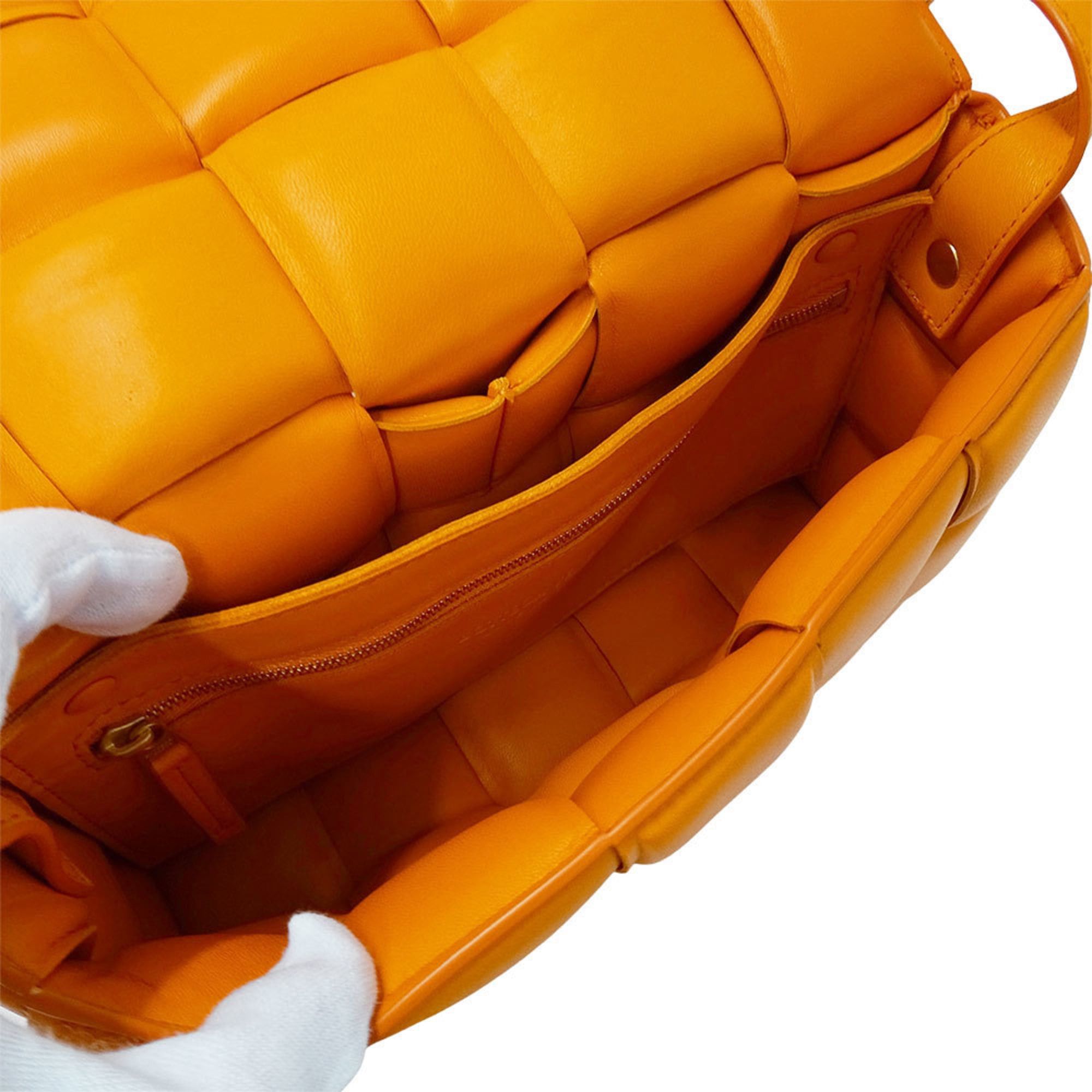 Bottega Veneta Bottega Veneta handbag for women, brand name Cassette shoulder bag, leather, orange, woven design. Size ONE SIZE - 6 Thumbnail