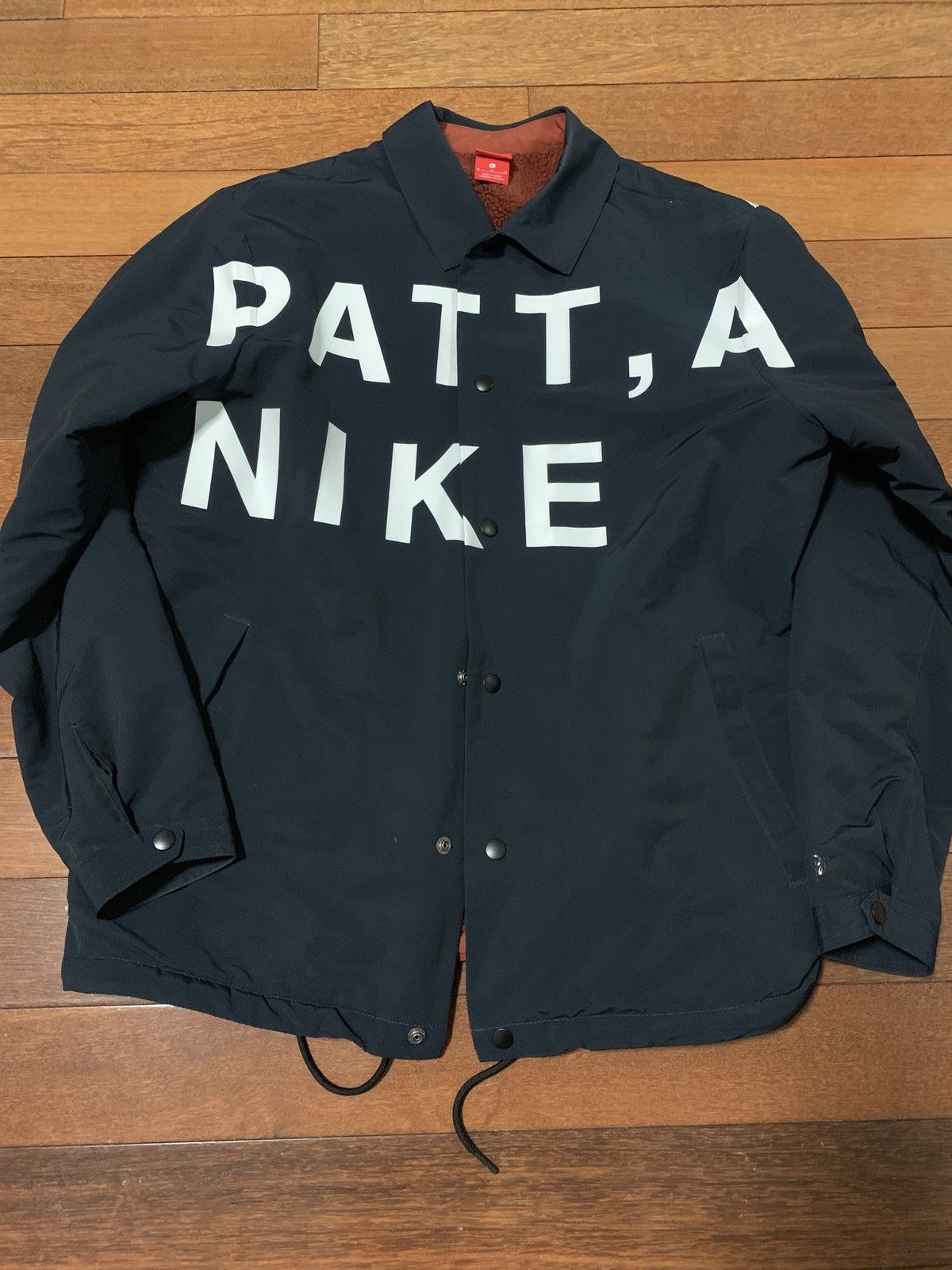 Patta x nike coach jacket hotsell