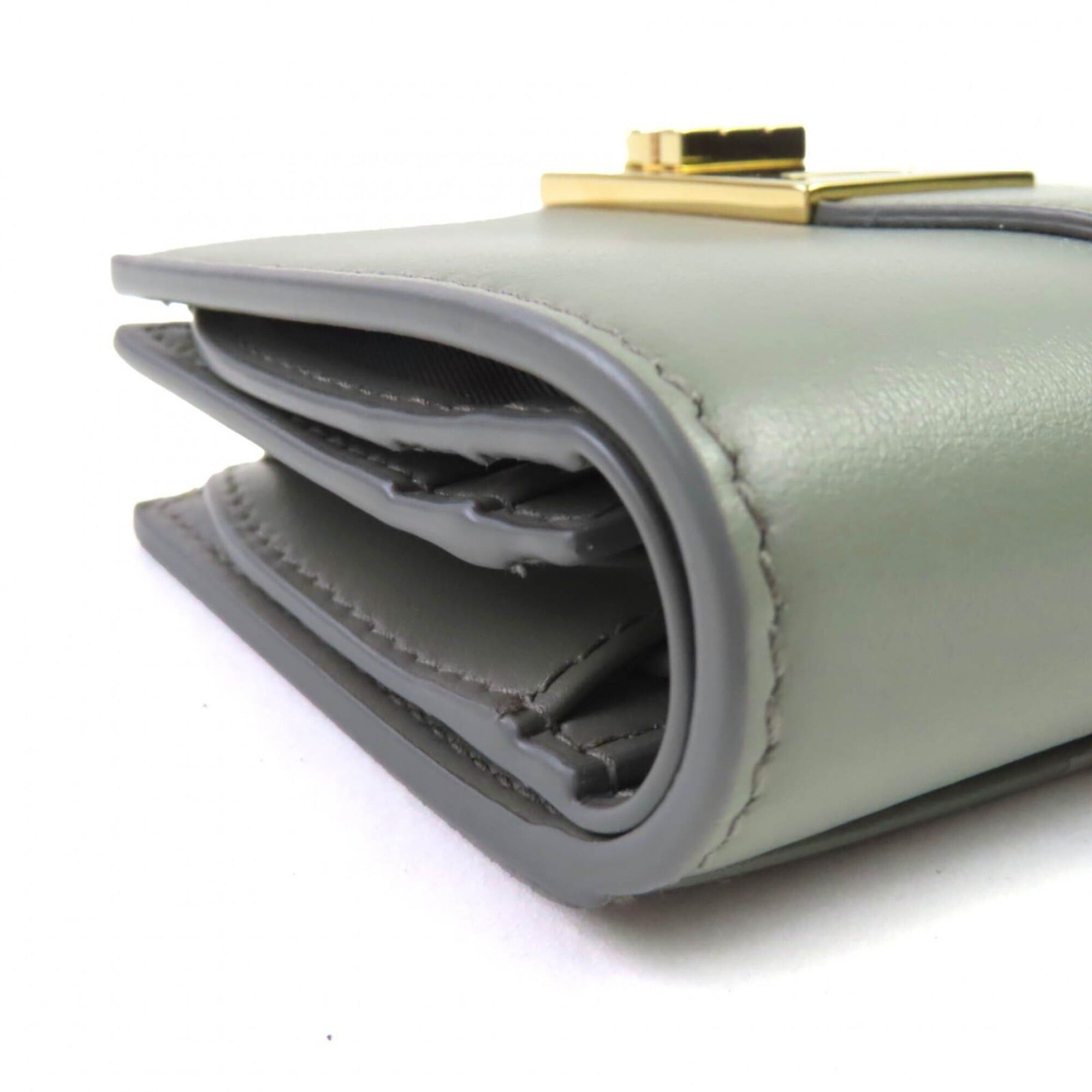 Salvatore Ferragamo Salvatore Ferragamo FERRAGAMO 0775288 Leather Compact Bi-fold Wallet with Gancini Hardware, Ash Gray, Gold Comes Box, Made in Italy, Women's Size ONE SIZE - 7 Thumbnail