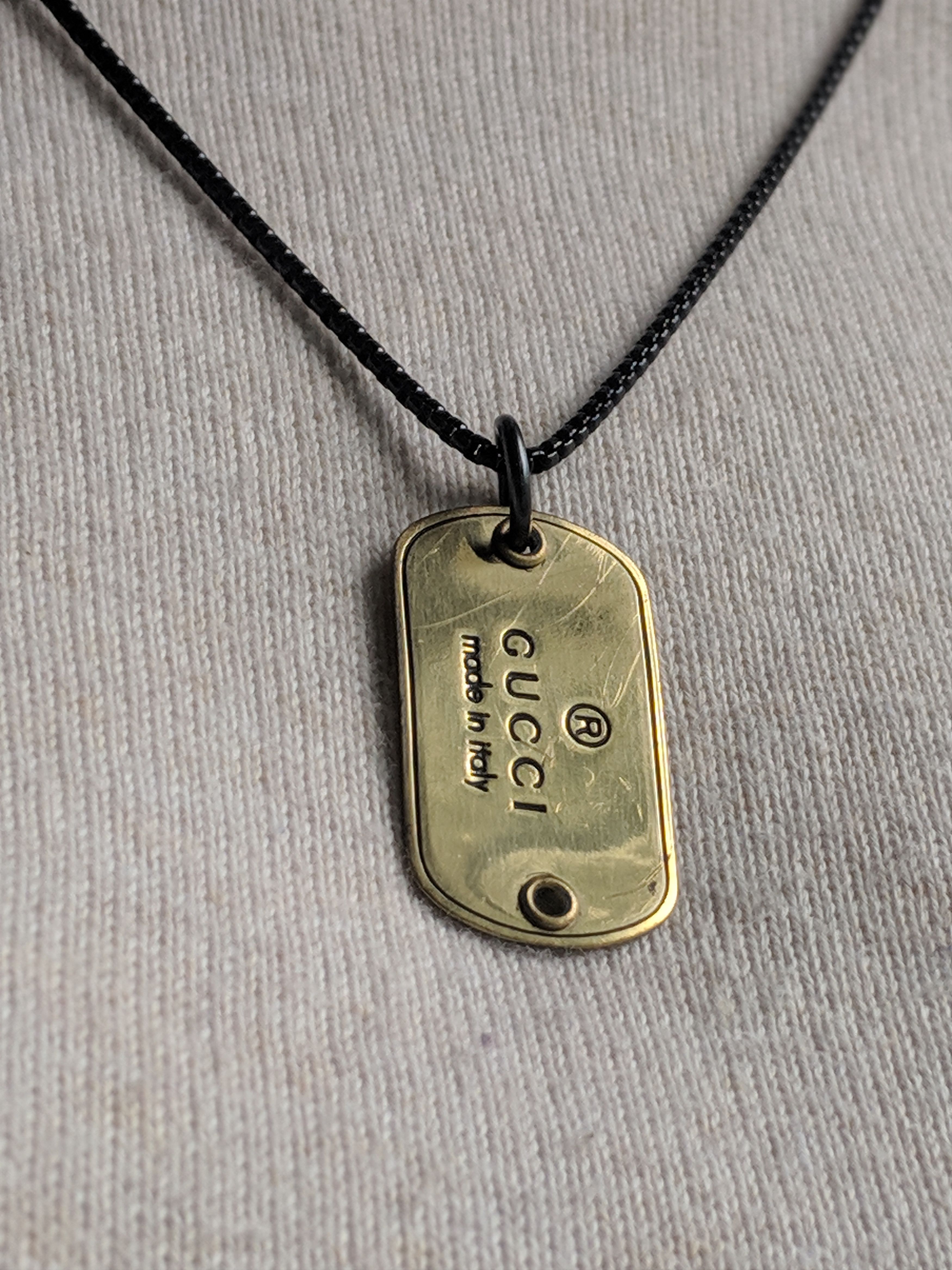 Gucci Authentic Gucci Dog Tag Charm Put in a Black Stainless Steel ...