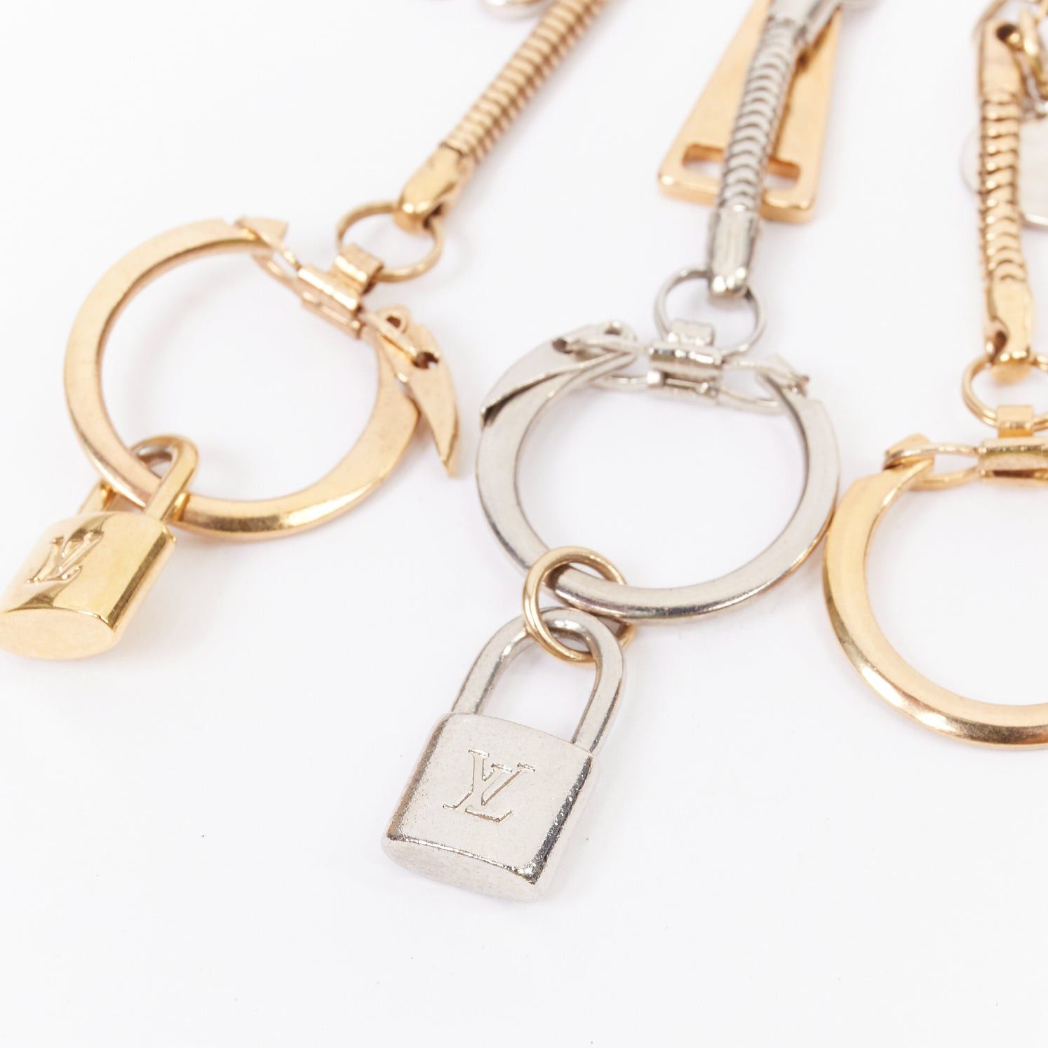 Louis Vuitton LOUIS VUITTON palladium gold plated safety pin with triple keyring LV lock heart flower charms Size ONE SIZE - 3 Thumbnail