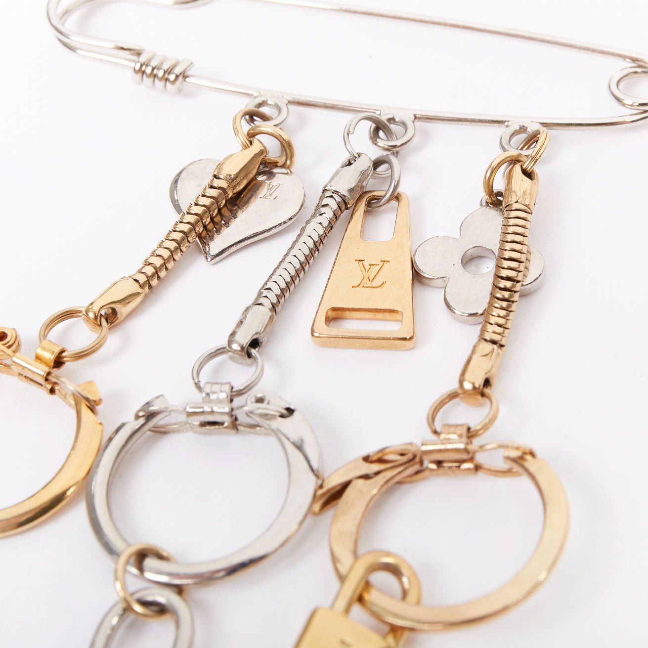 Louis Vuitton LOUIS VUITTON palladium gold plated safety pin with triple keyring LV lock heart flower charms Size ONE SIZE - 6 Thumbnail