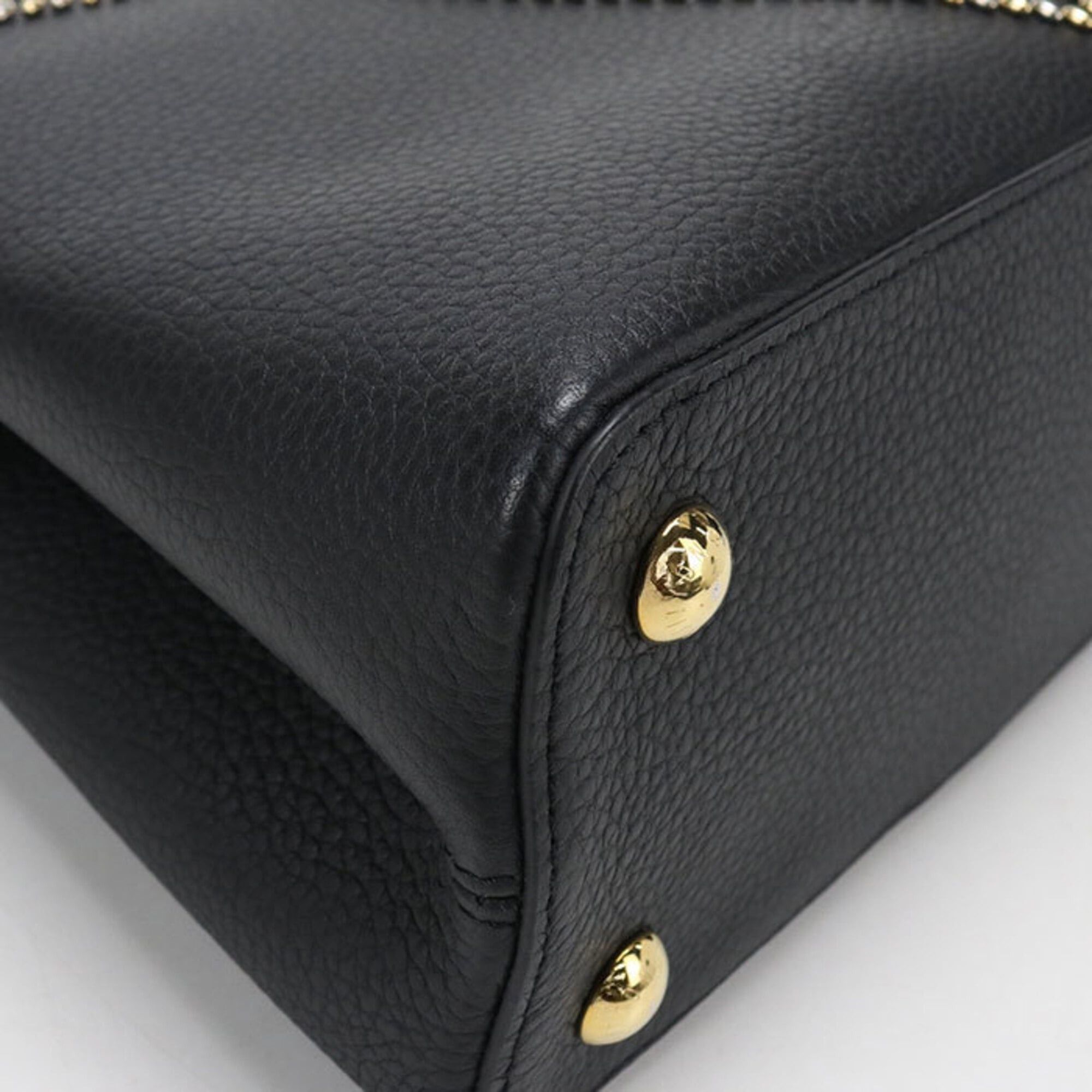 Louis Vuitton Louis Vuitton Capucines PM handbag, Taurillon leather, women's, black. Size ONE SIZE - 4 Thumbnail