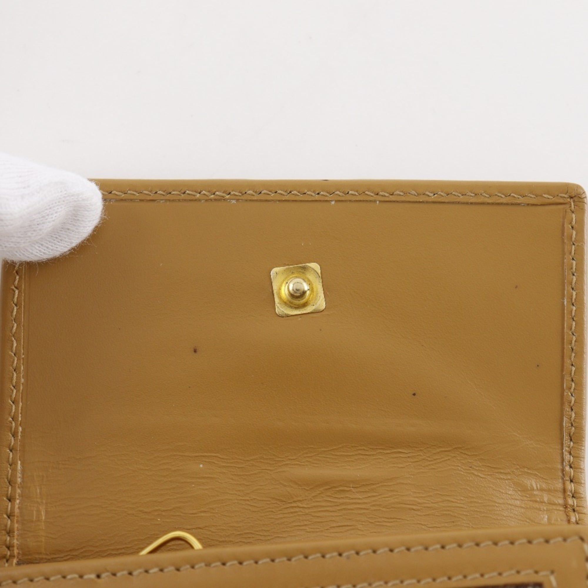 Gucci Gucci key case, model number 033.0416.0881, GG canvas, ochre color, snap button closure, unisex. Size ONE SIZE - 11 Thumbnail