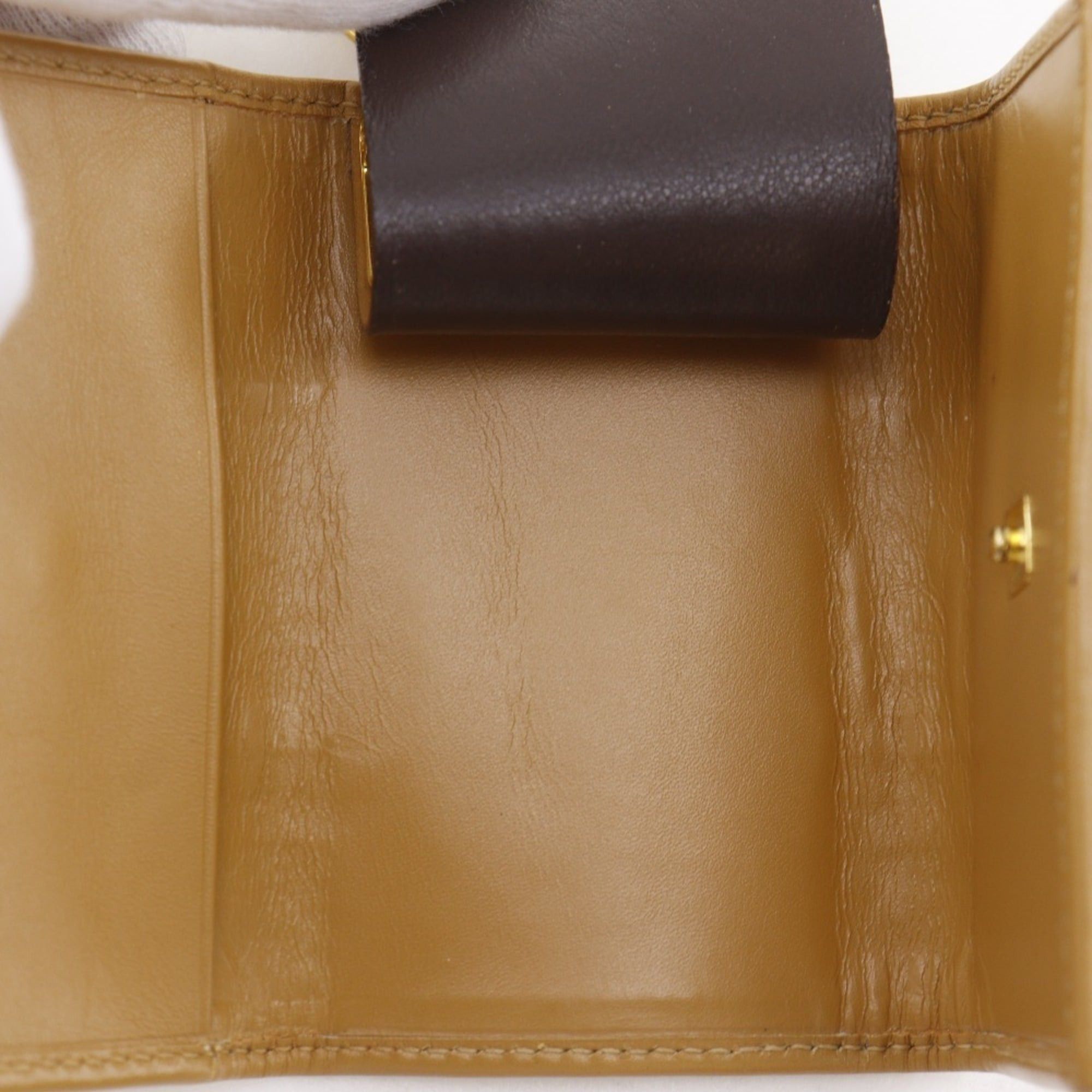 Gucci Gucci key case, model number 033.0416.0881, GG canvas, ochre color, snap button closure, unisex. Size ONE SIZE - 8 Thumbnail