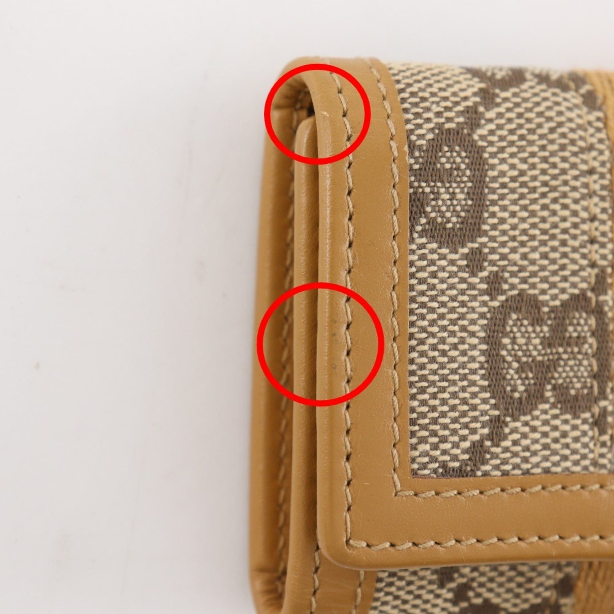 Gucci Gucci key case, model number 033.0416.0881, GG canvas, ochre color, snap button closure, unisex. Size ONE SIZE - 12 Thumbnail