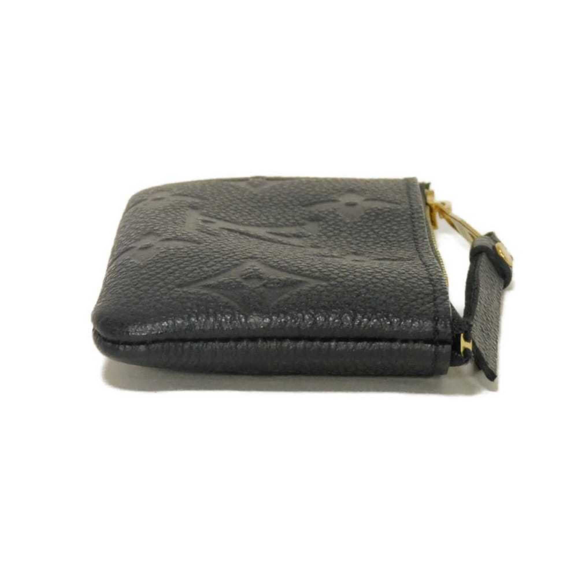 Louis Vuitton Louis Vuitton coin case, Pochette Clé, LV logo, flower embossed, key ring, Monogram Empreinte Noir, M80879, for men and women. Size ONE SIZE - 14 Thumbnail
