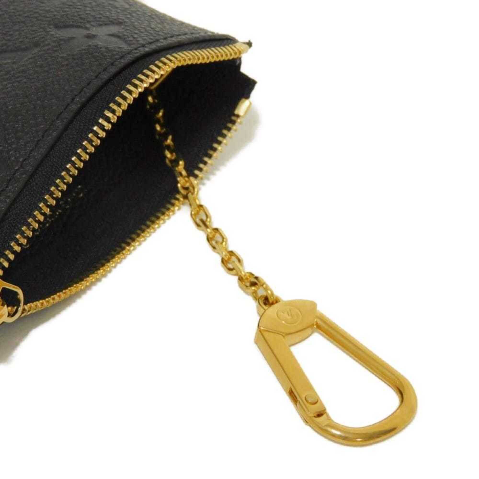 Louis Vuitton Louis Vuitton coin case, Pochette Clé, LV logo, flower embossed, key ring, Monogram Empreinte Noir, M80879, for men and women. Size ONE SIZE - 9 Thumbnail