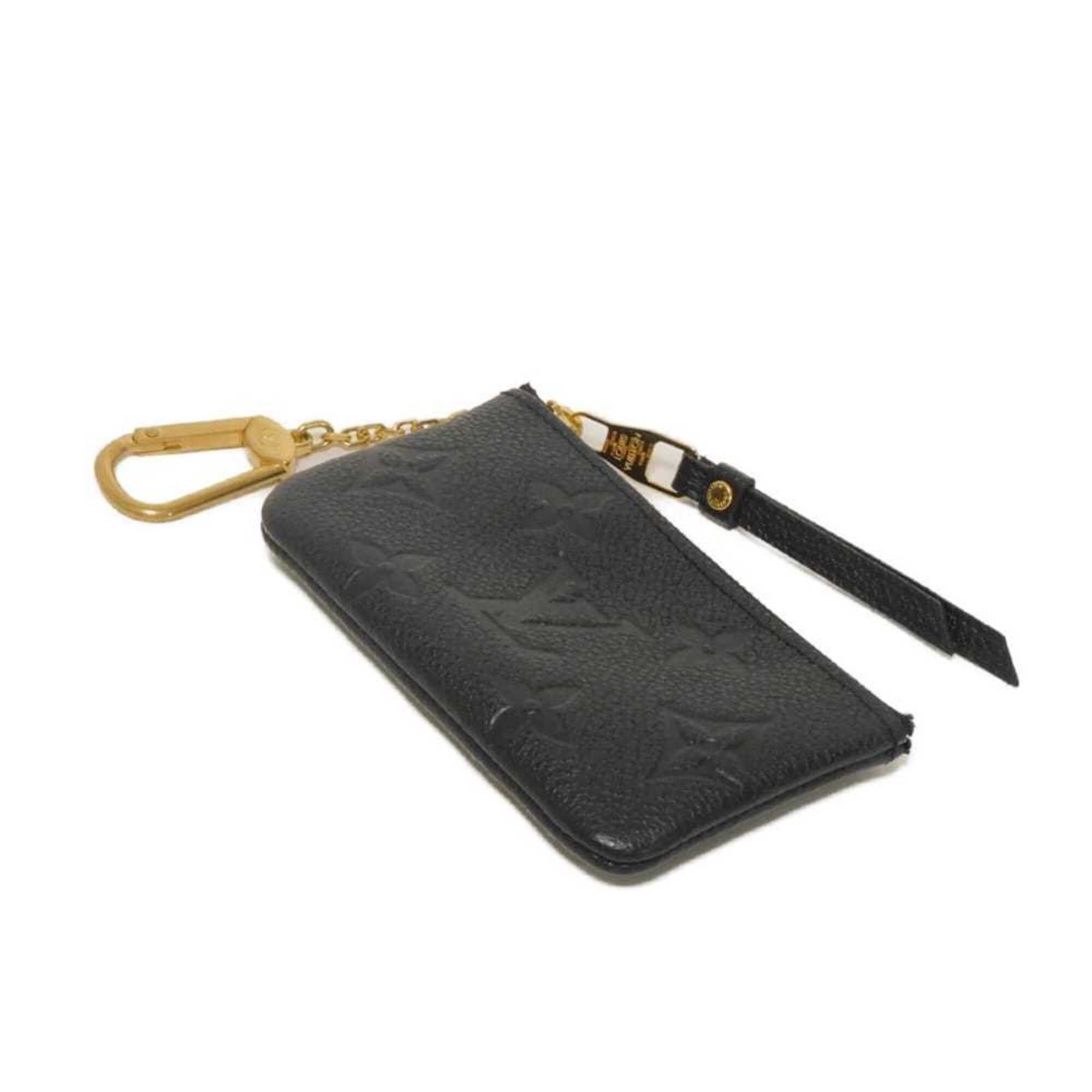 Louis Vuitton Louis Vuitton coin case, Pochette Clé, LV logo, flower embossed, key ring, Monogram Empreinte Noir, M80879, for men and women. Size ONE SIZE - 4 Thumbnail