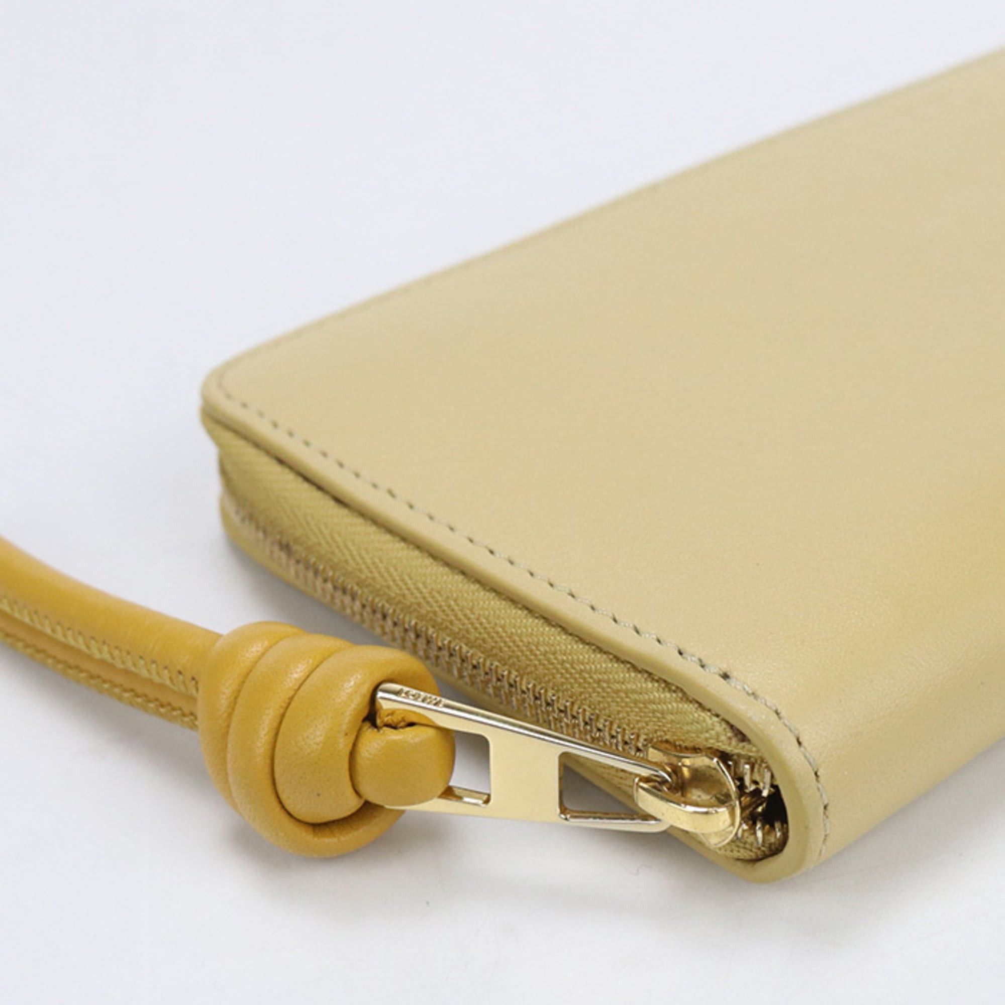 Loewe LOEWE women's zip-around long wallet with round zipper and knot design, yellow. Size ONE SIZE - 5 Thumbnail