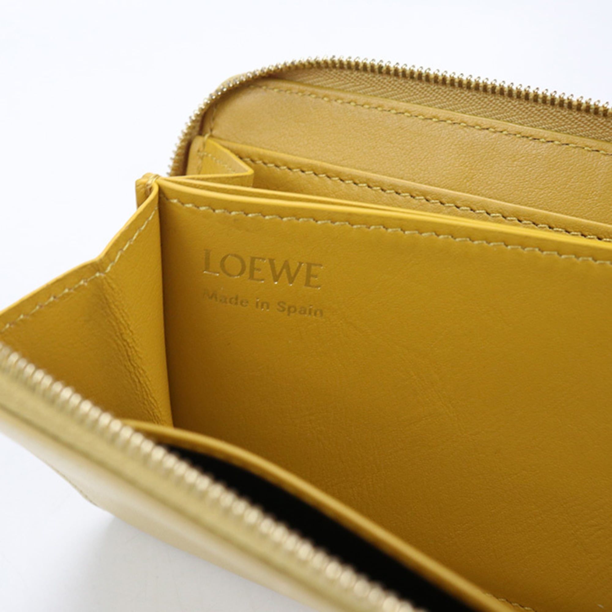 Loewe LOEWE women's zip-around long wallet with round zipper and knot design, yellow. Size ONE SIZE - 7 Thumbnail