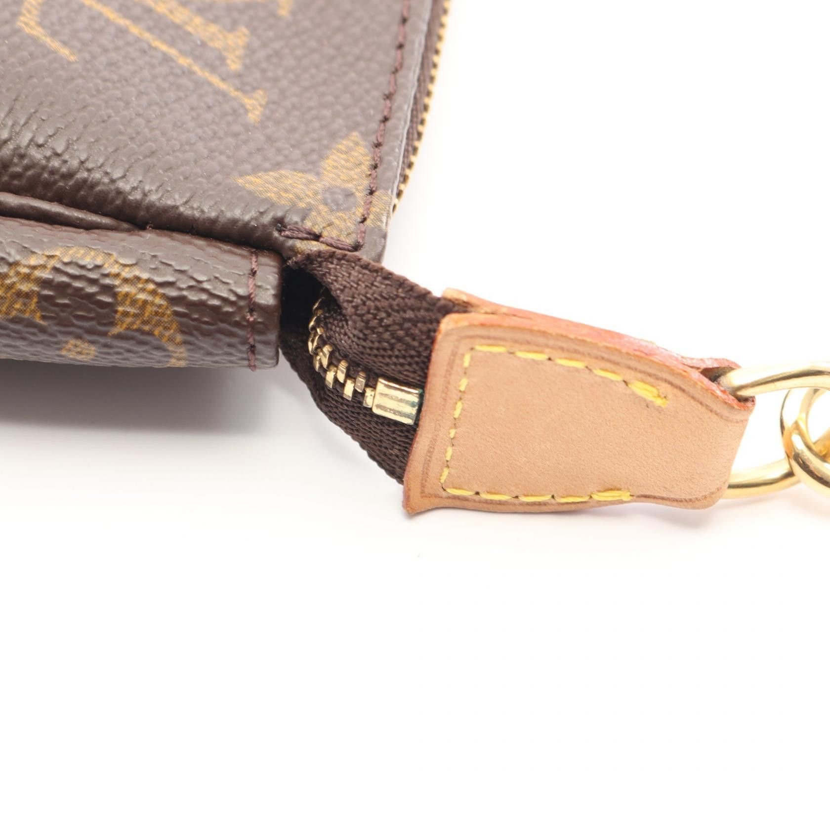 Louis Vuitton Louis Vuitton Louis Vuitton Pochette Accessoires Monogram Clutch Bag Textile Handbag M51980 DUTY FREE for USA Size ONE SIZE - 9 Thumbnail