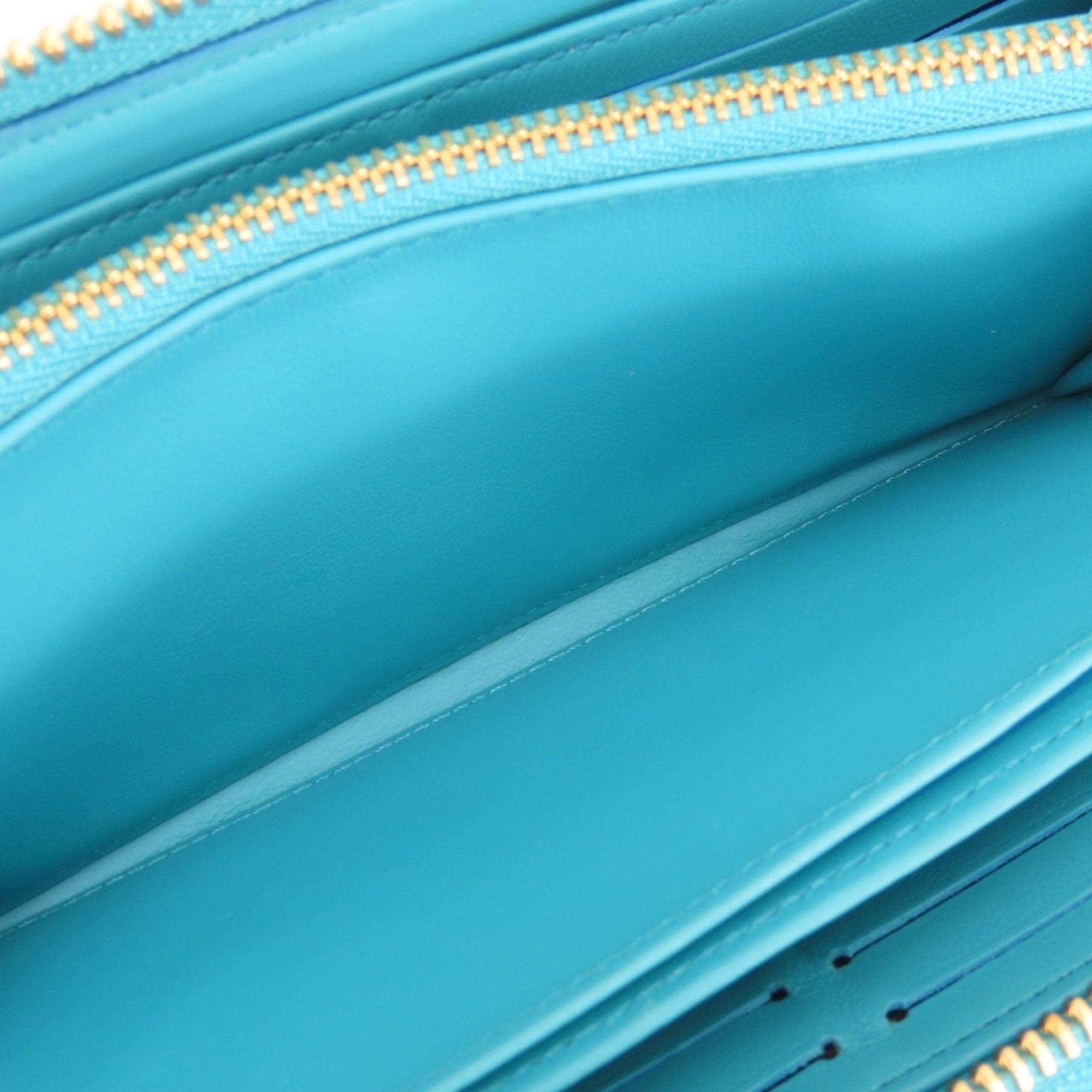 Louis Vuitton Louis Vuitton Zippy Wallet Coussin M81512 Monogram Turquoise Blue Embossed Long for Women LOUIS VUITTON Size ONE SIZE - 17 Thumbnail