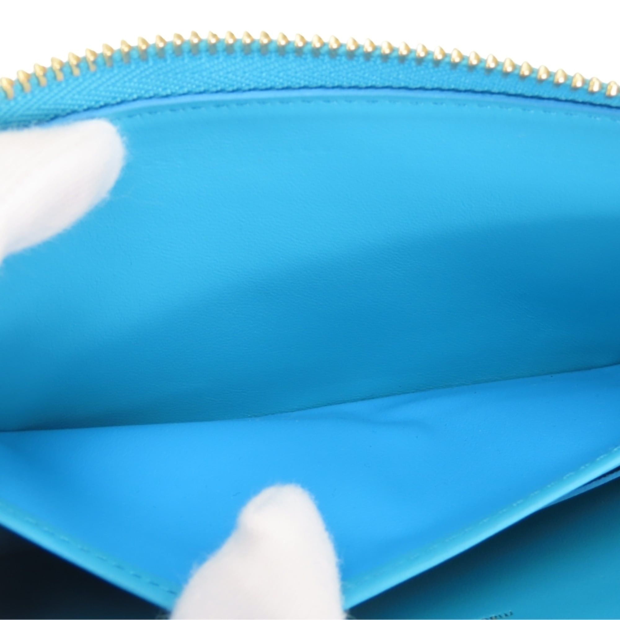 Louis Vuitton Louis Vuitton Zippy Wallet Coussin M81512 Monogram Turquoise Blue Embossed Long for Women LOUIS VUITTON Size ONE SIZE - 24 Thumbnail