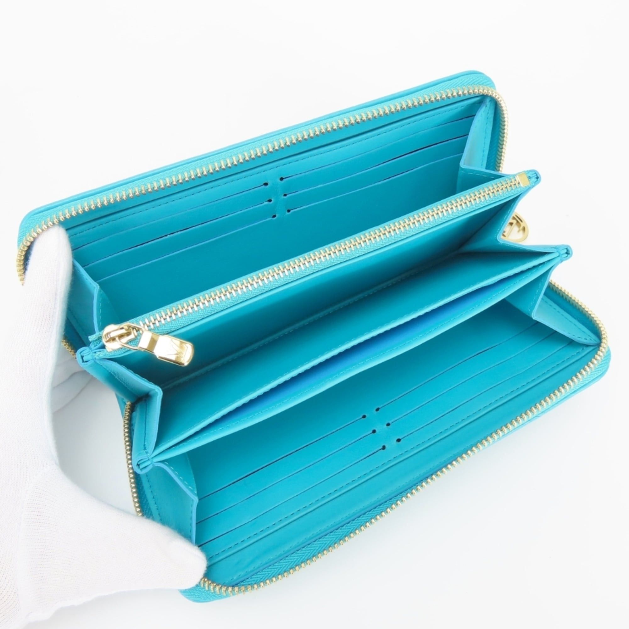 Louis Vuitton Louis Vuitton Zippy Wallet Coussin M81512 Monogram Turquoise Blue Embossed Long for Women LOUIS VUITTON Size ONE SIZE - 13 Thumbnail