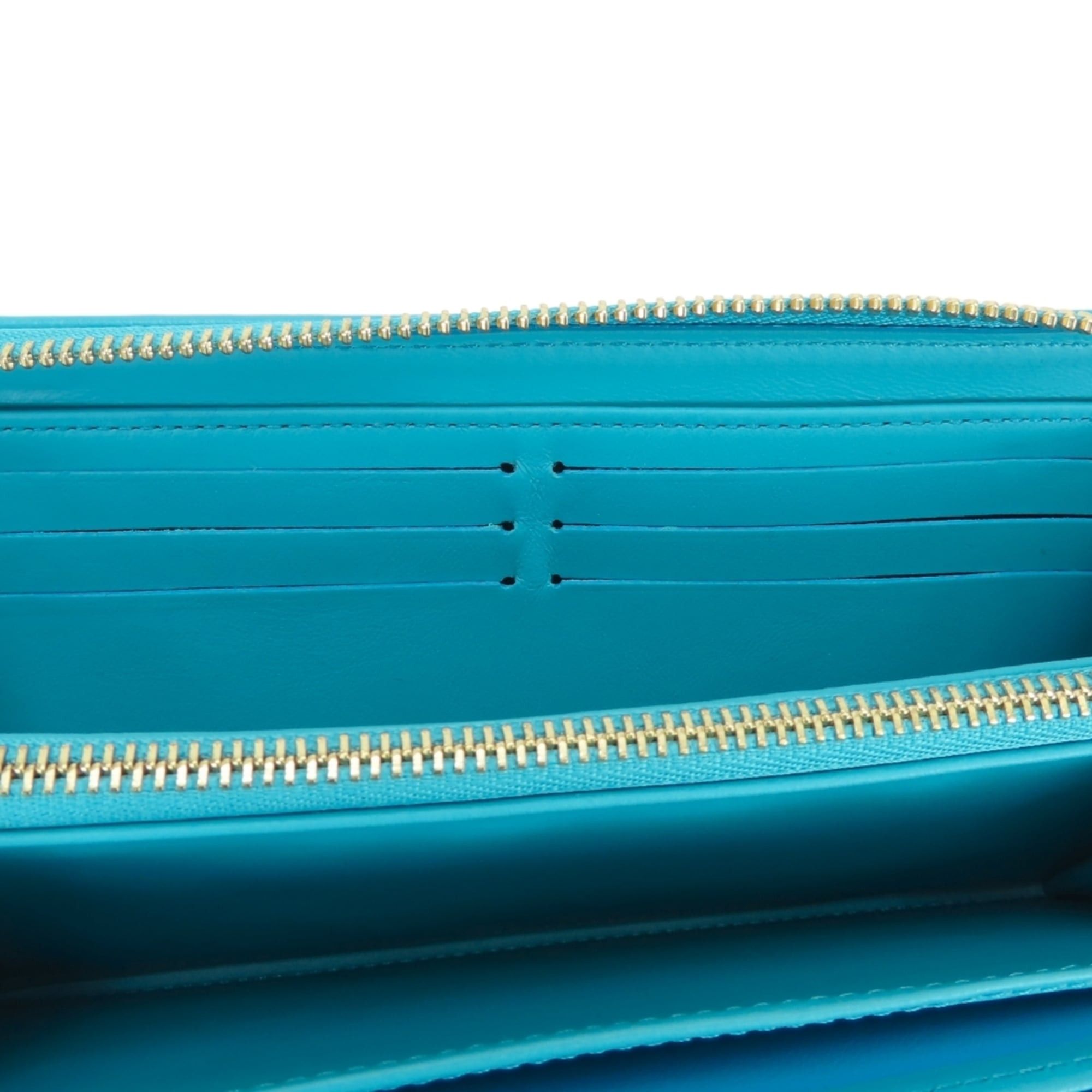 Louis Vuitton Louis Vuitton Zippy Wallet Coussin M81512 Monogram Turquoise Blue Embossed Long for Women LOUIS VUITTON Size ONE SIZE - 14 Thumbnail