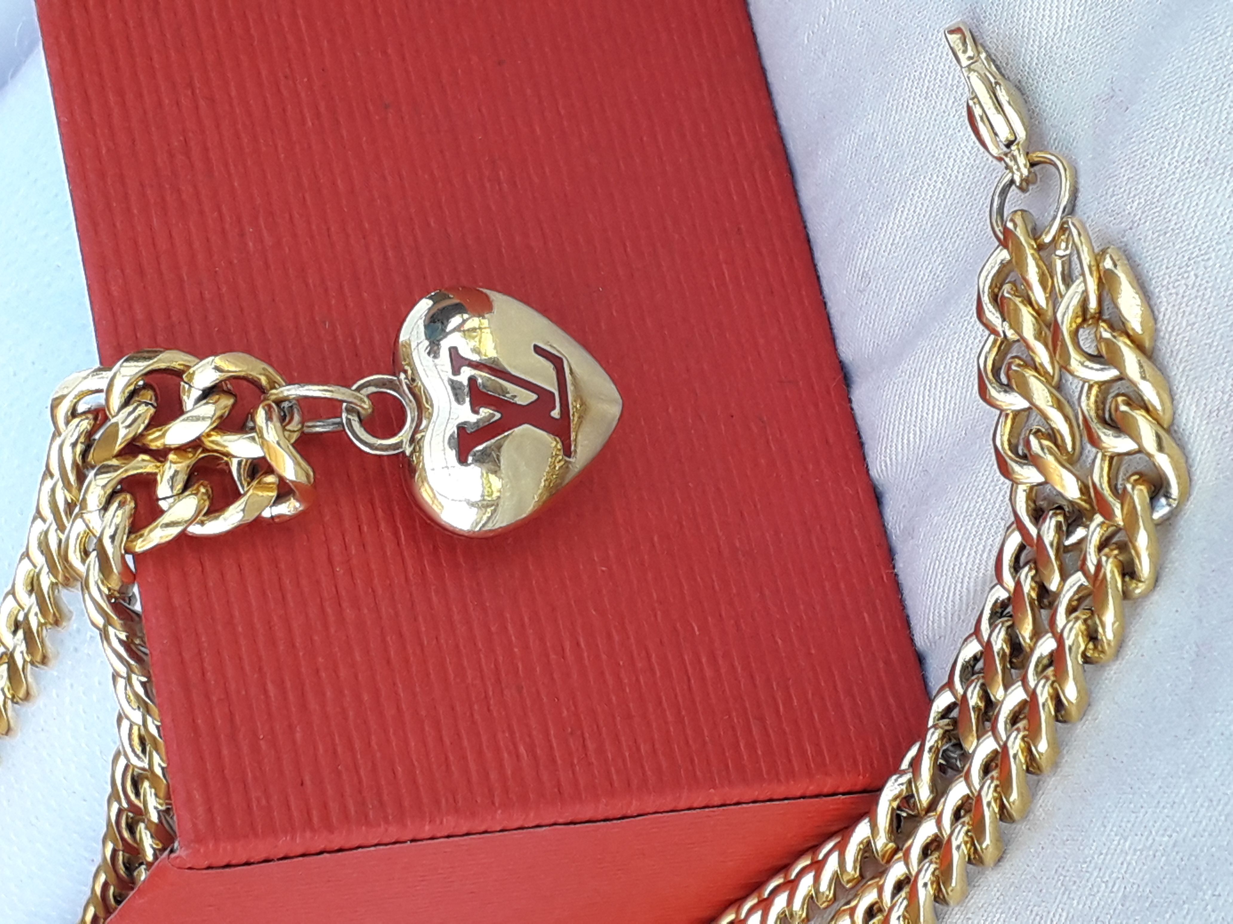 Louis Vuitton Authentic Louis Vuitton Gold Heart & Red LV Necklace
