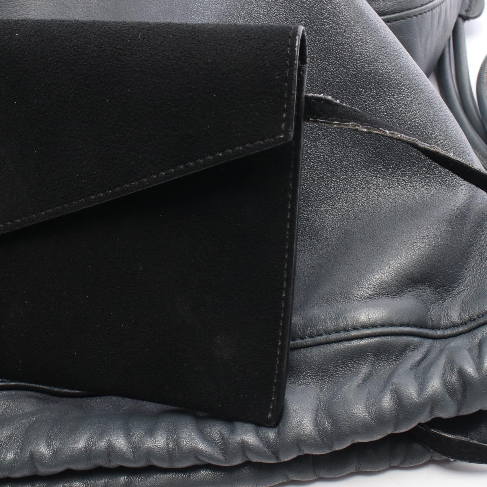 Yves Saint Laurent Saint Laurent Paris Teddy Leather  display picture 1
