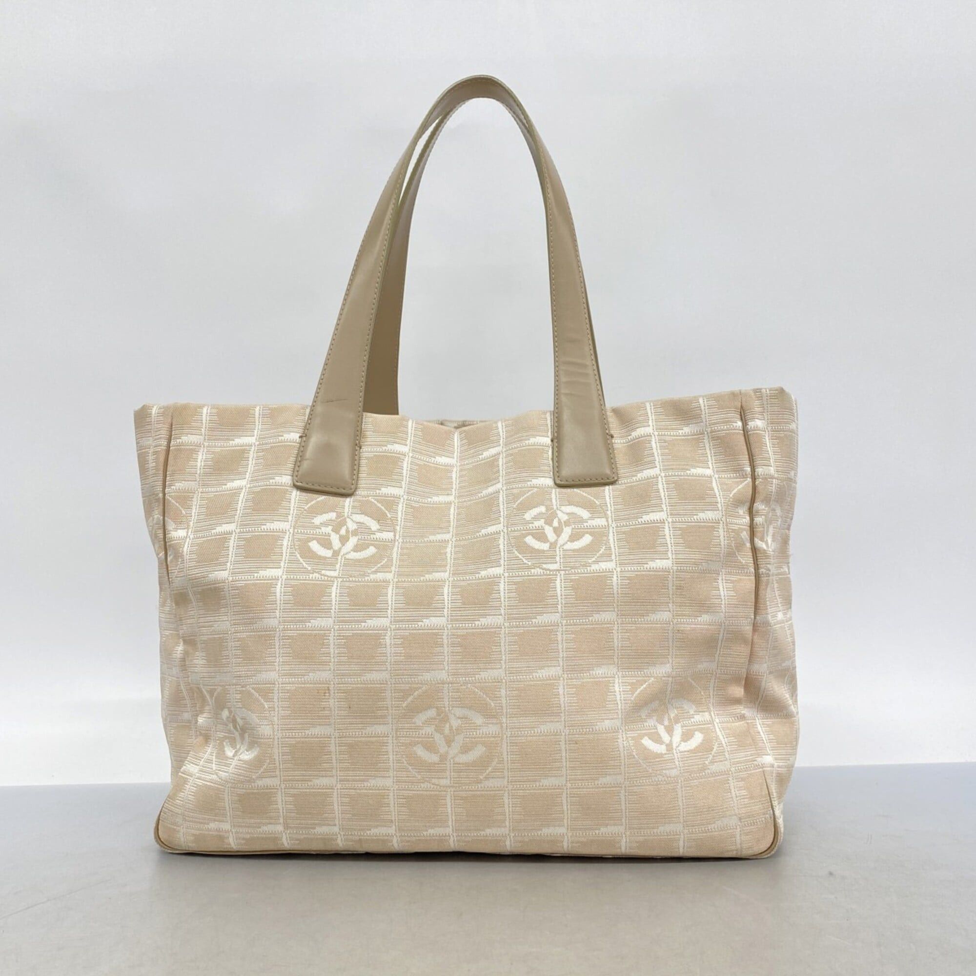 chanel beige travel tote bag New Line Nylon Jacquard 2way Crossbody P1 – NUIR VINTAGE Pre Loved Chanel New Travel Line Tote Introducing the epitome of elegance and functionality Chanel Cream New Travel Line