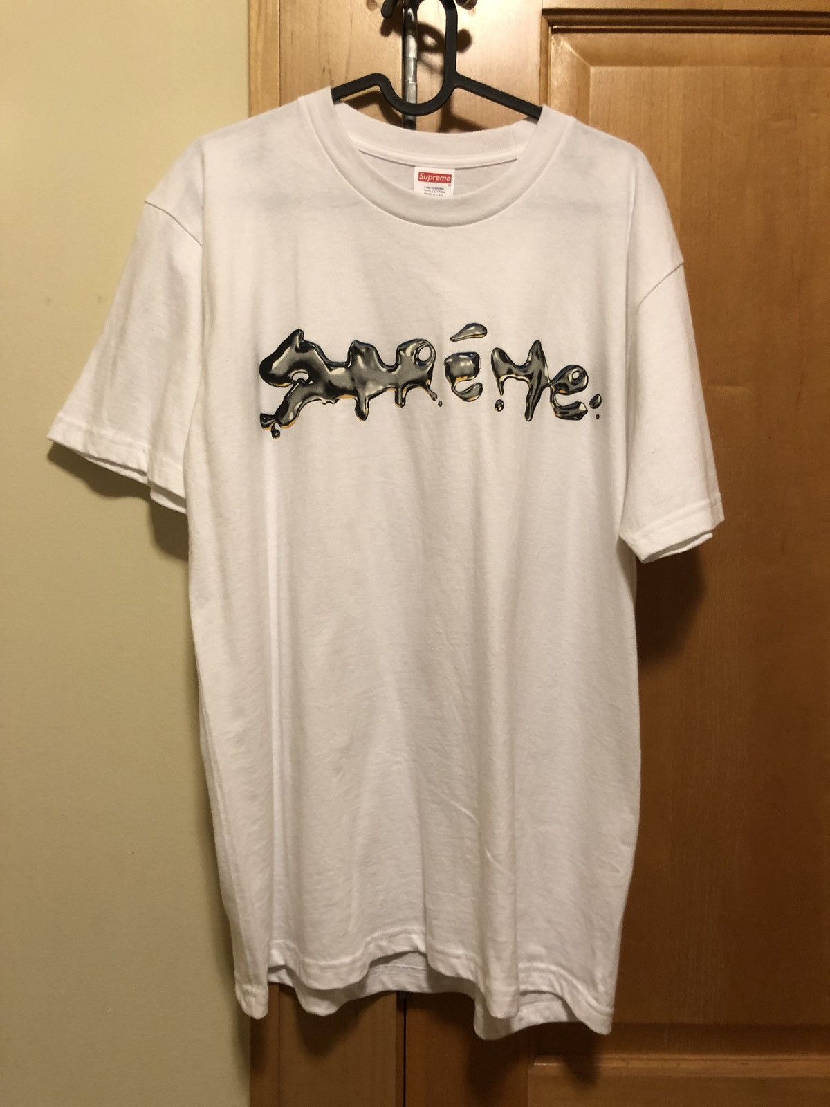 Supreme liquid tee white clearance