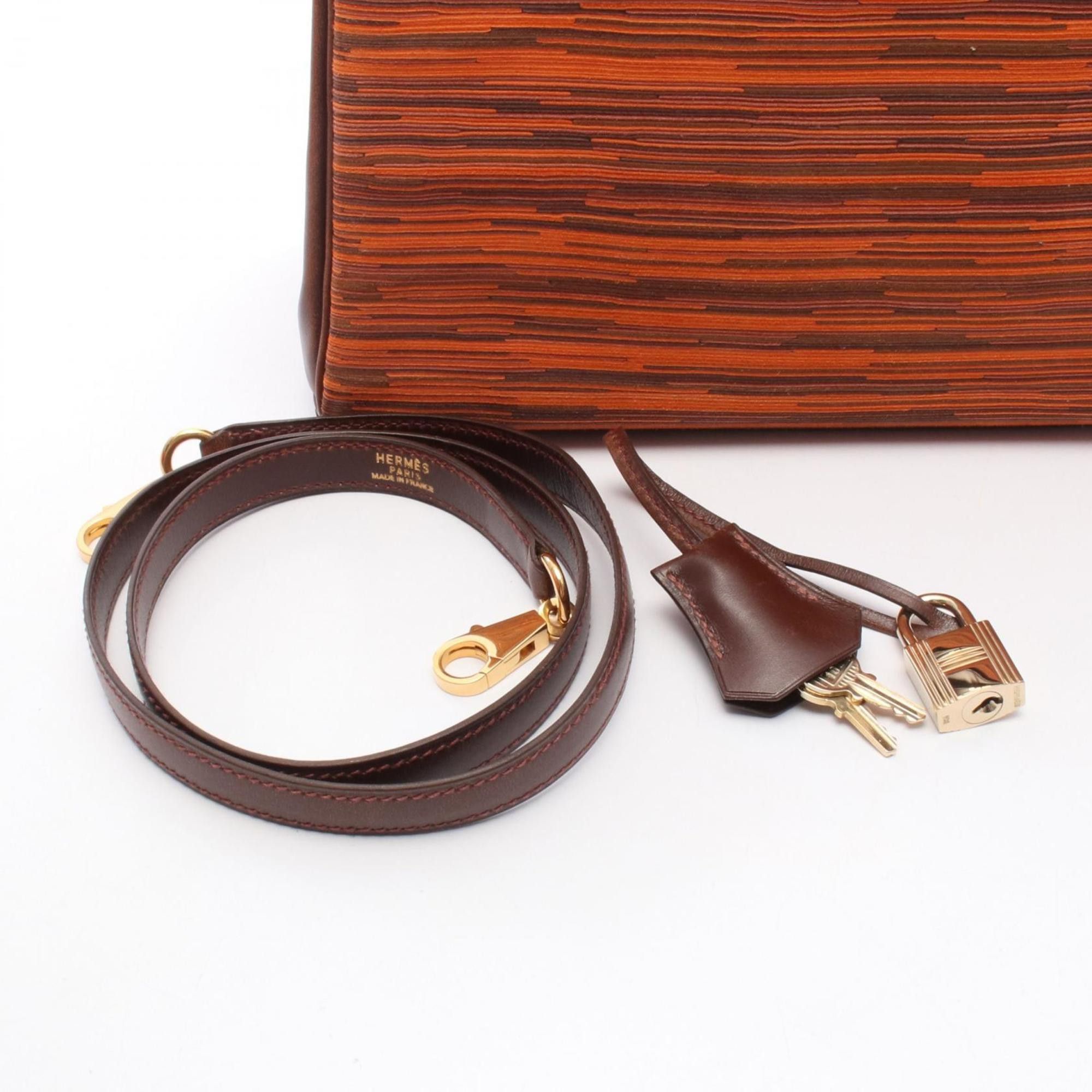 Hermes Hermes Hermès Kelly 28 handbag in calfskin with a Vibrato strap. Available orange, brown, and multicolor. Size ONE SIZE - 6 Thumbnail