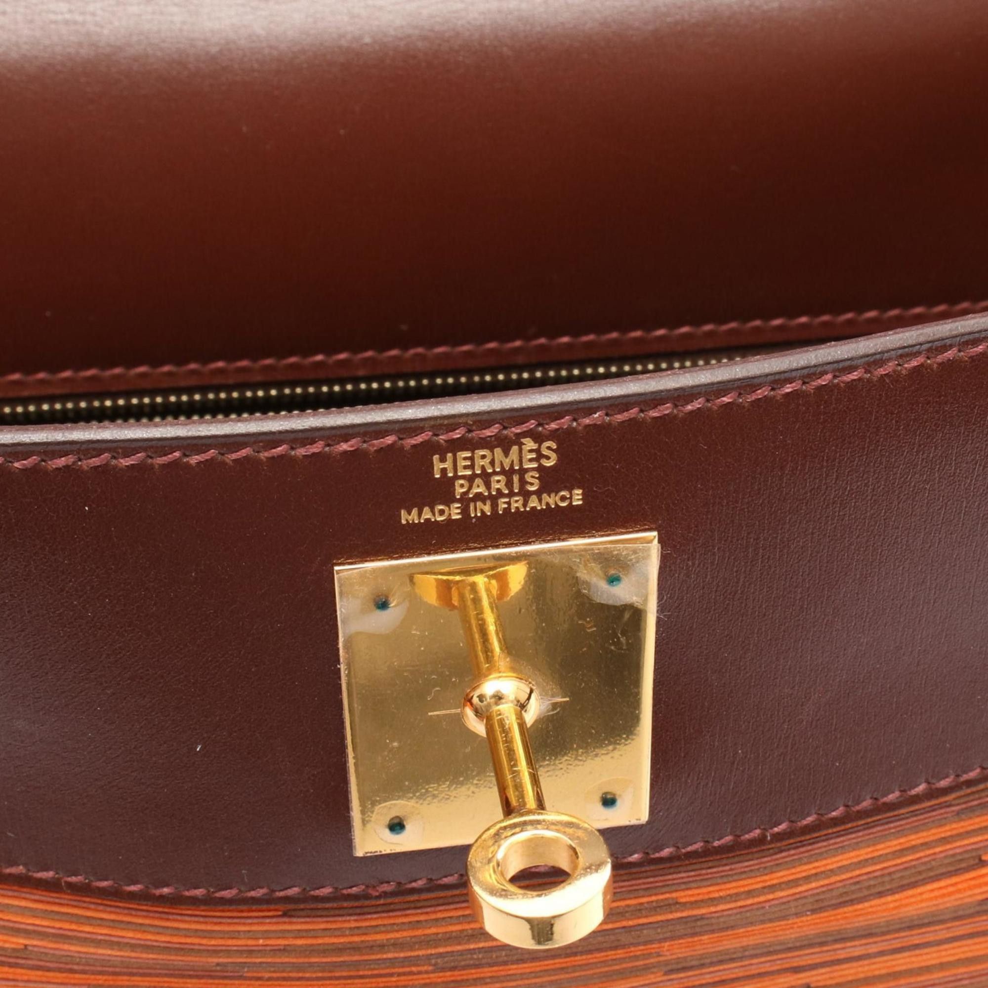Hermes Hermes Hermès Kelly 28 handbag in calfskin with a Vibrato strap. Available orange, brown, and multicolor. Size ONE SIZE - 4 Thumbnail