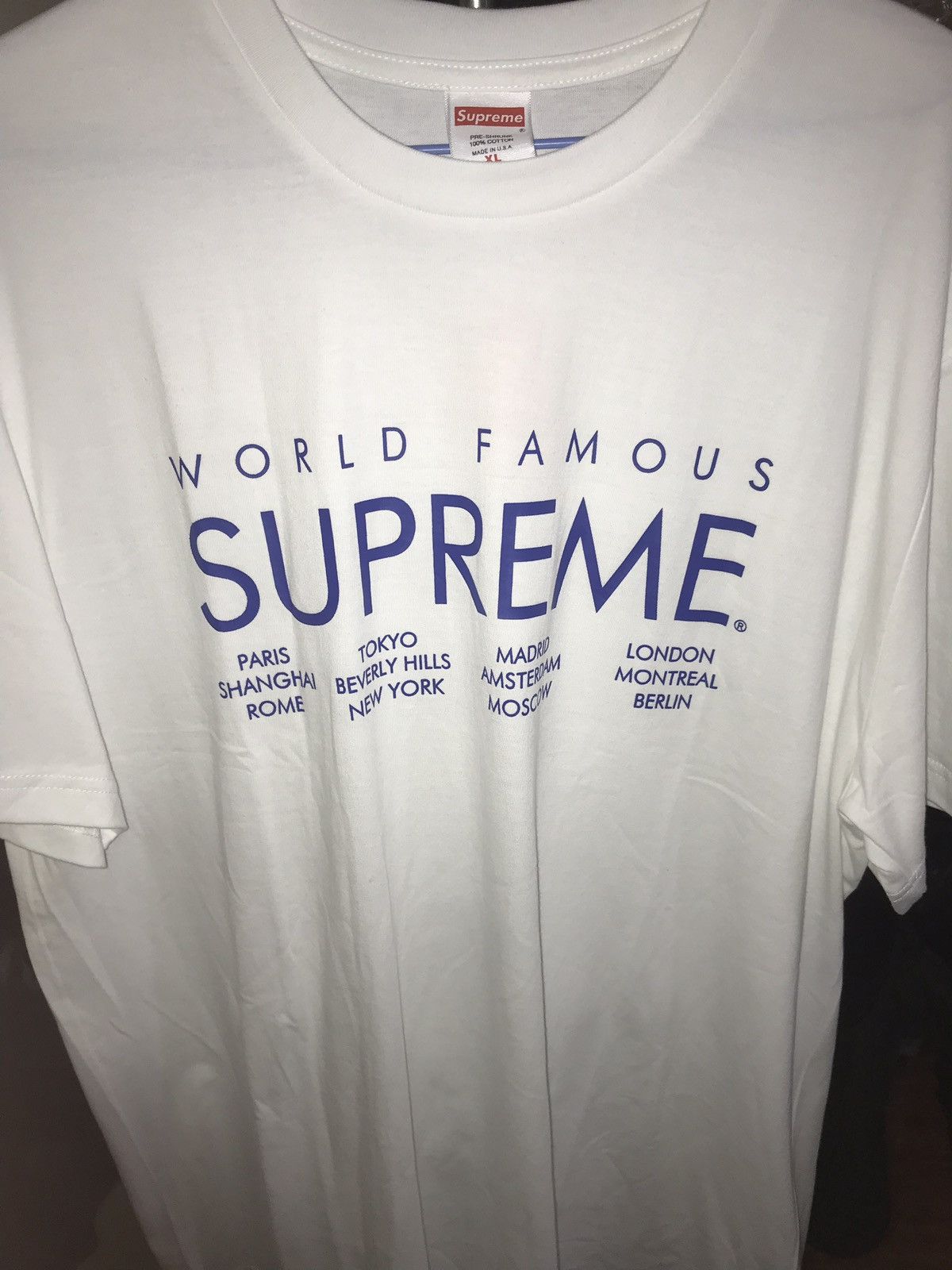 Supreme world hotsell famous t shirt