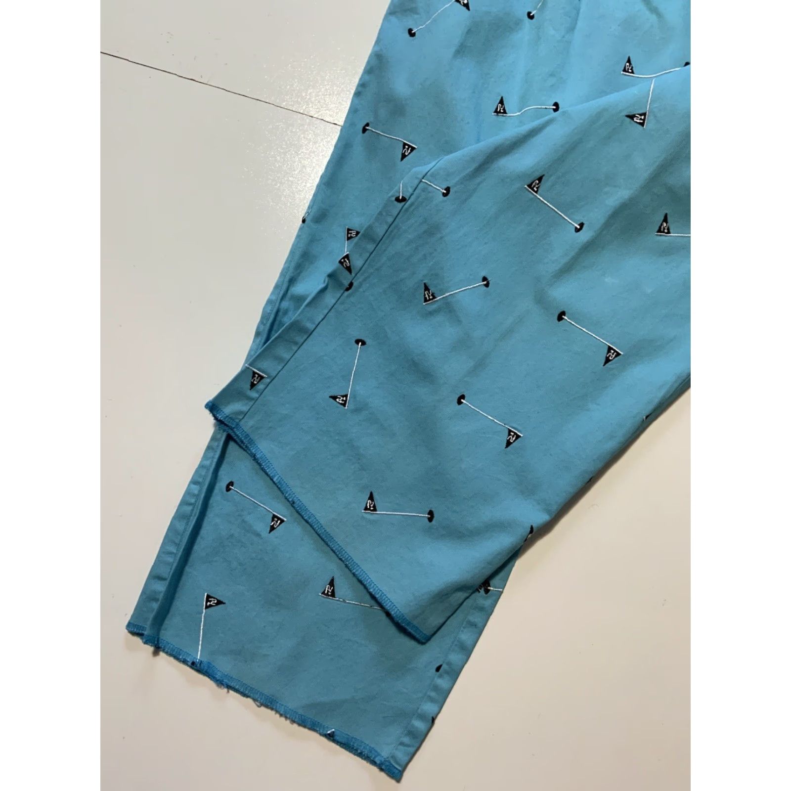 Poler Rosasen Golf Flagpole All Over Print Turquoise Performance Pants 38 Men Regular Turquoise Pants Flag 34 Inseam Mens Size US 38 / EU 54 - 7 Thumbnail