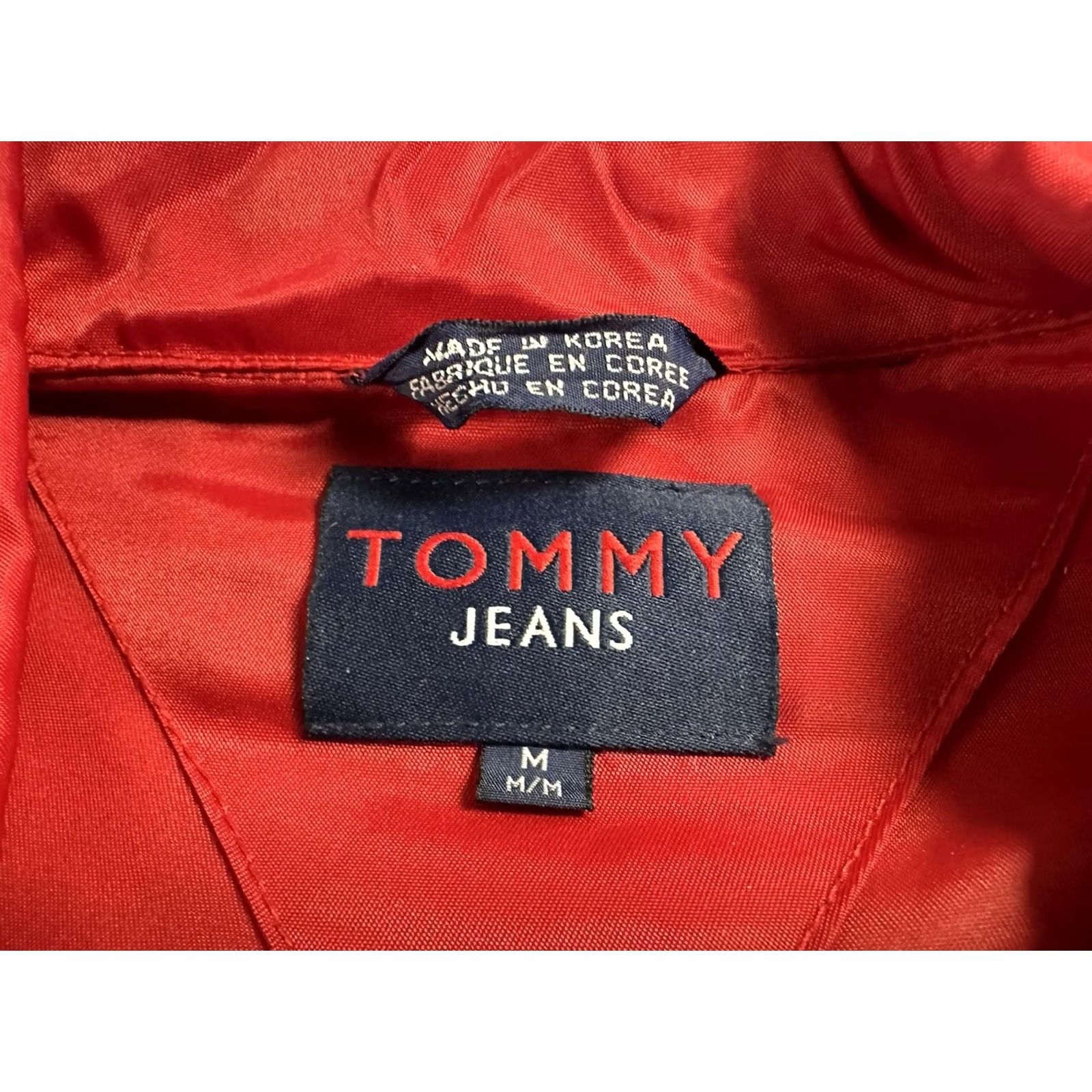 Tommy Hilfiger VTG Tommy Hilfiger Jeans Jacket Mens Medium Red Logo Windbreaker Hooded Nylon Front Zip Button Snap Sailor Windbreaker *Flaw" Size US 31 - 5 Thumbnail
