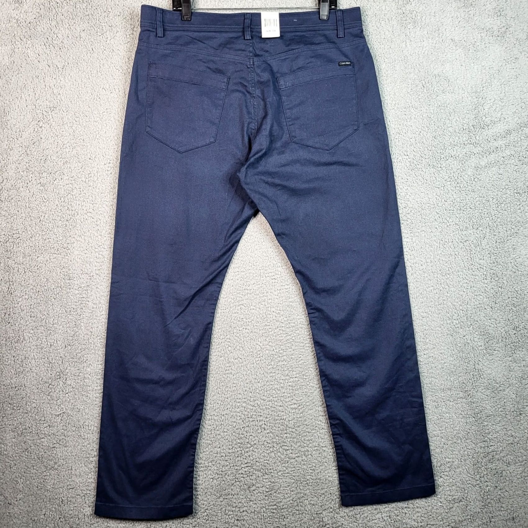 Calvin Klein Calvin Klein Royal Navy Men's Casual straight leg Pants 36W 32L Blue Cotton Blend Elastane Regular 36 Inseam 32 Button Closure Casual Mens Pants Size US 36 / EU 52 - 3 Thumbnail