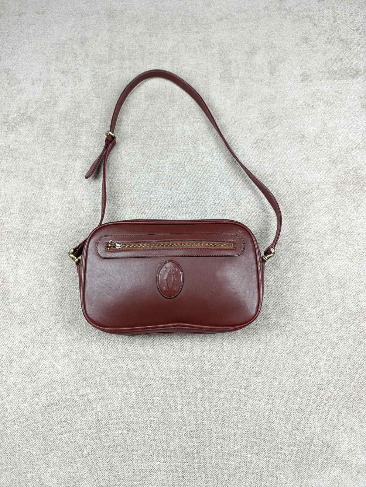 Cartier CARTIER BORDEAUX LEATHER SHOULDER BAG VINTAGE DESIGN UNISEX Size ONE SIZE - 1 Thumbnail